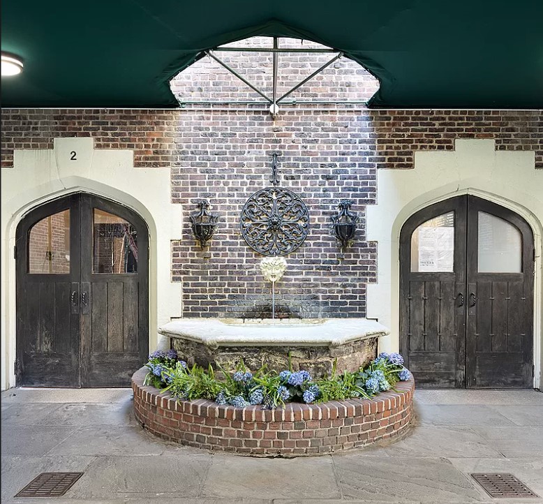 2 Grace Court, Unit 2C Brooklyn, NY 11201 - Photo 9 of 15 a front view of a house with a garden