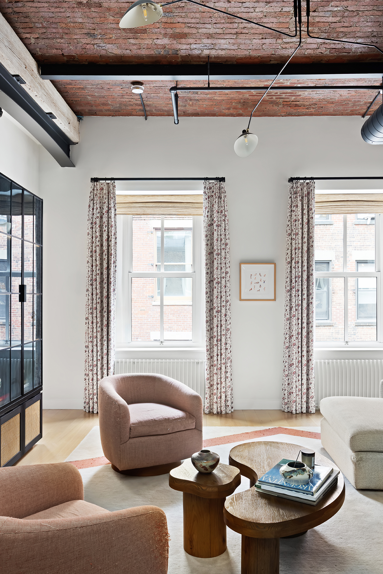 63 Greene Street, Unit PHB Manhattan, NY 10012 - Photo 8 of 17 a living room with furniture and window