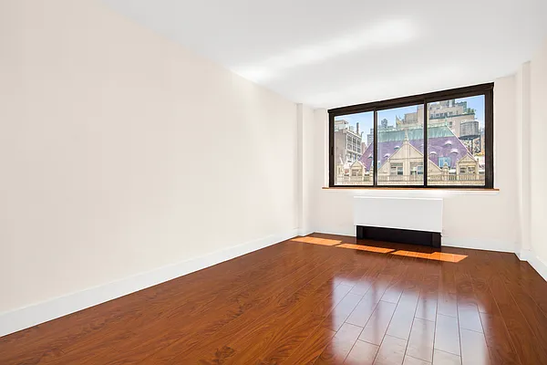 280 Park Avenue South, Unit 7A Manhattan, NY 10010 - Photo 6 of 13 a bedroom with a bed and a window