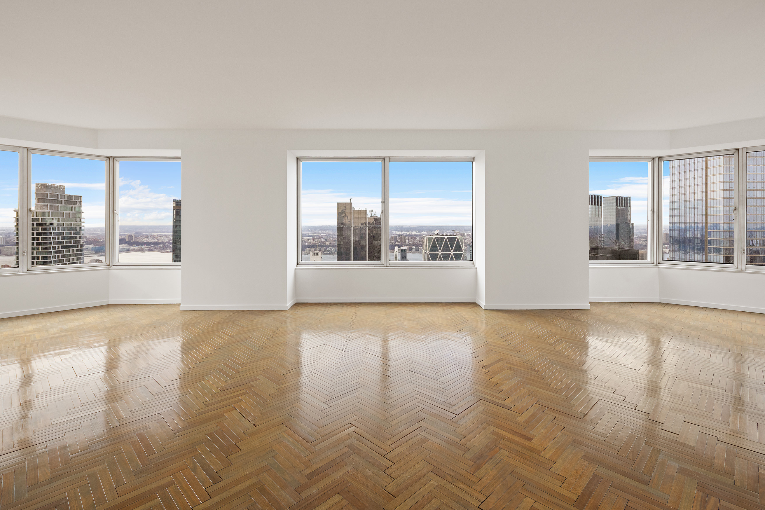 150 West 56th Street, Unit 6204 Manhattan, NY 10019 - Photo 2 of 15 a view of an empty room with a window