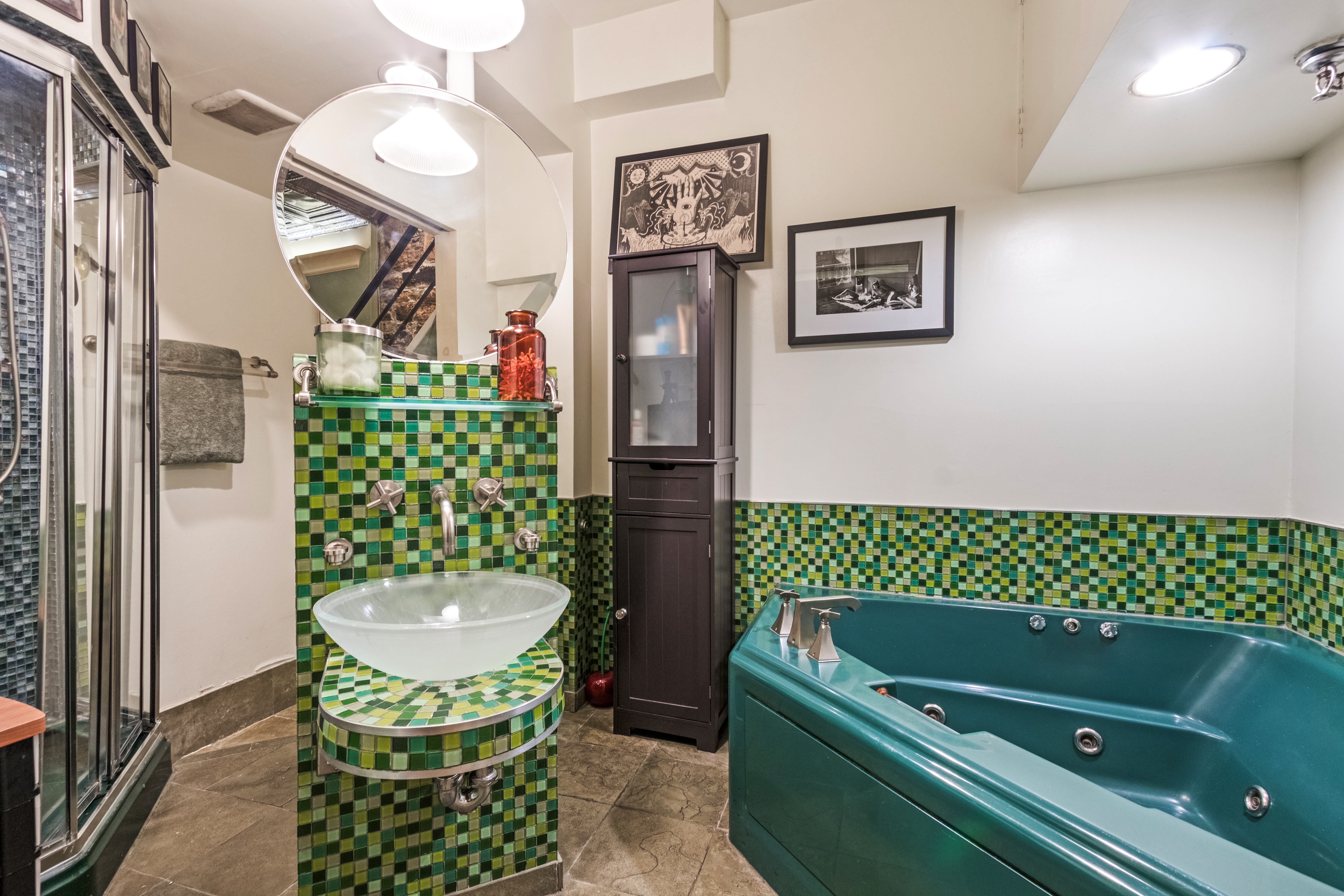 324 Pearl Street, Unit 1F Manhattan, NY 10038 - Photo 10 of 12 a bathroom with a sink a mirror and a bathtub