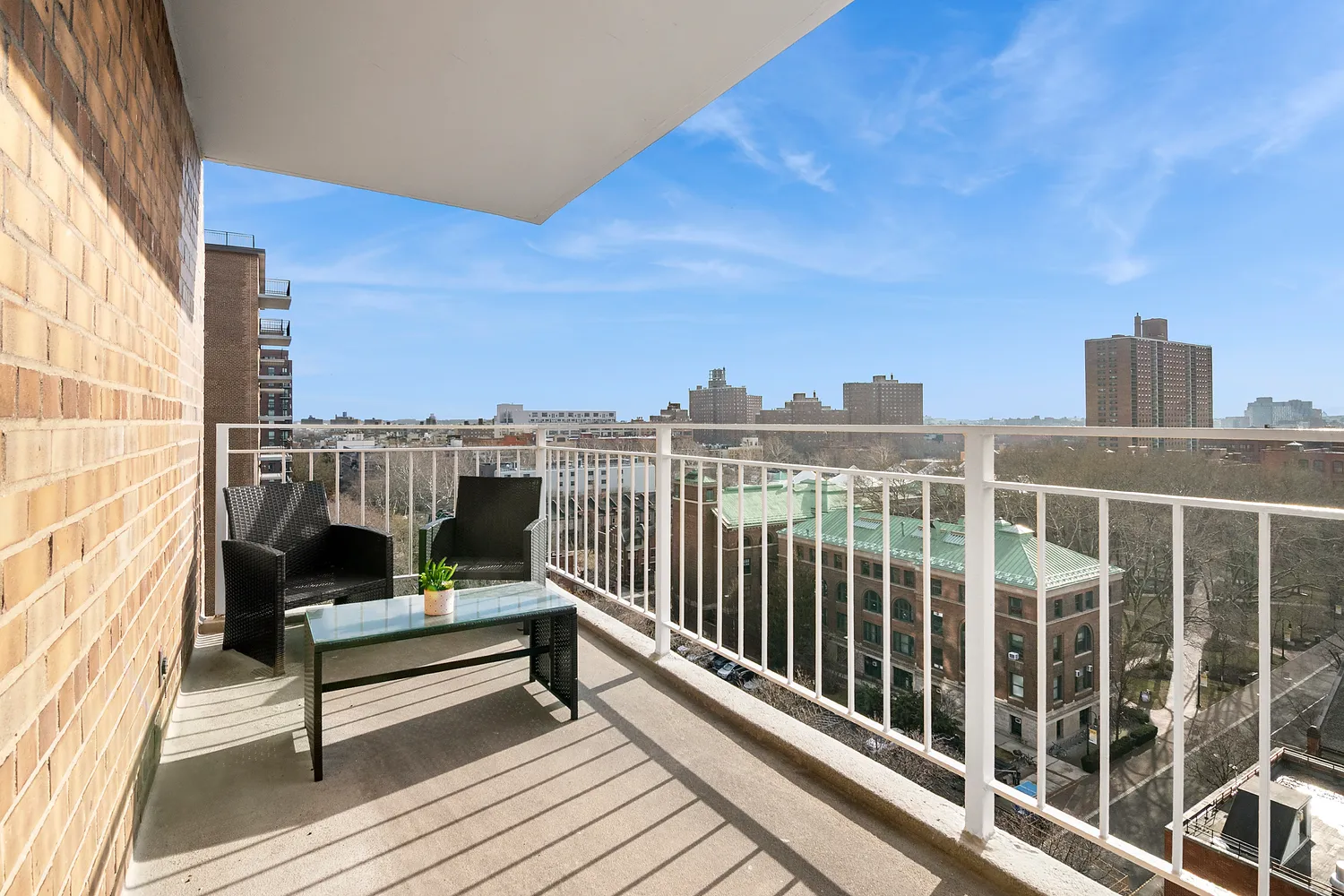 a view of a balcony with city view