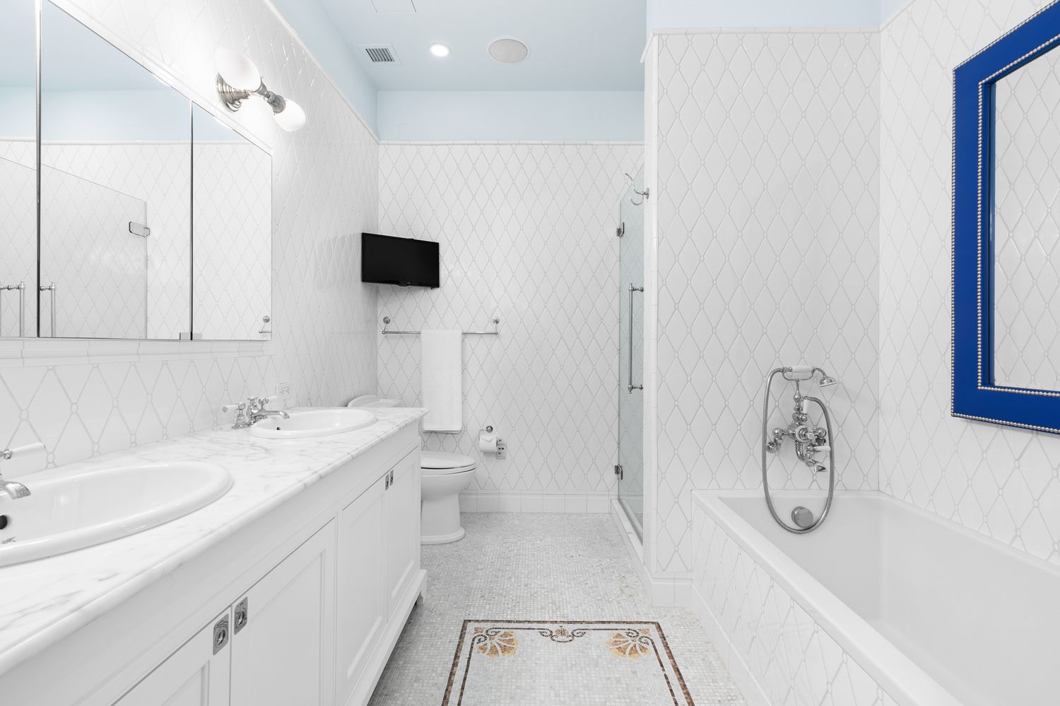 1 Central Park South, Unit 913 Manhattan, NY 10019 - Photo 6 of 23 a bathroom with a granite countertop sink a toilet and a shower