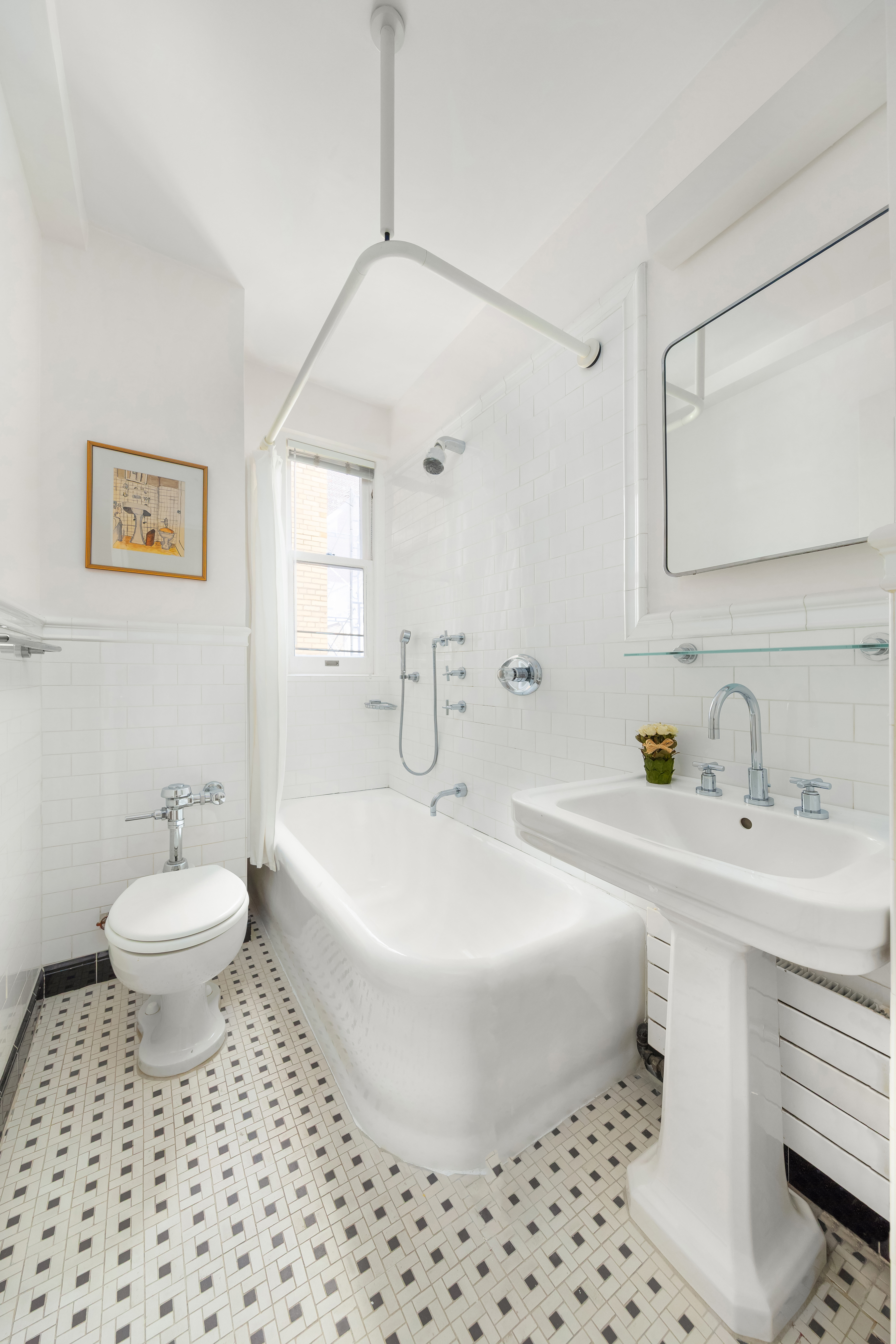 162 East 80th Street Manhattan, NY 10075 - Photo 10 of 13 a bathroom with a sink toilet and a mirror