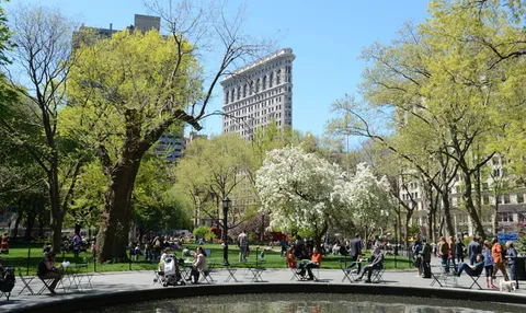 front view of a building with trees