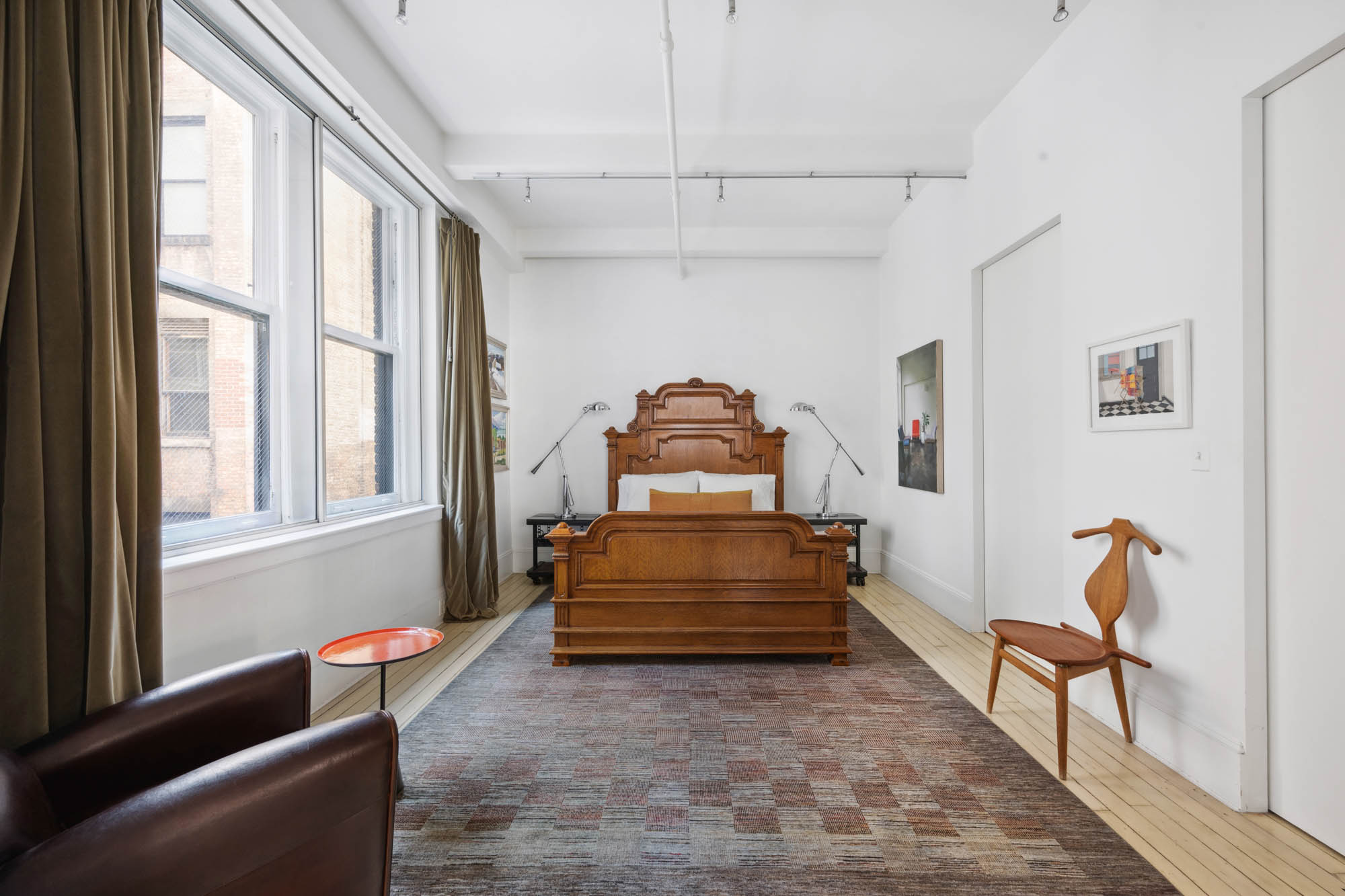7 East 20th Street, Unit 6R Manhattan, NY 10003 - Photo 7 of 14 a room with furniture and a window