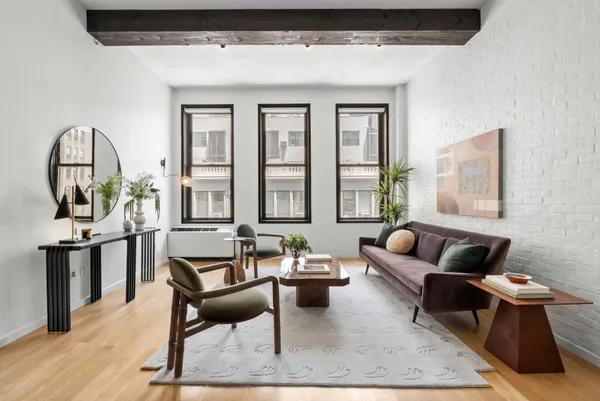 a kitchen with a stove and a sink