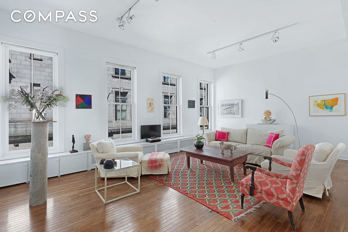 6 Centre Market Place, Unit 3 Manhattan, NY 10013 - Photo 1 of 9 a living room with furniture and wooden floor