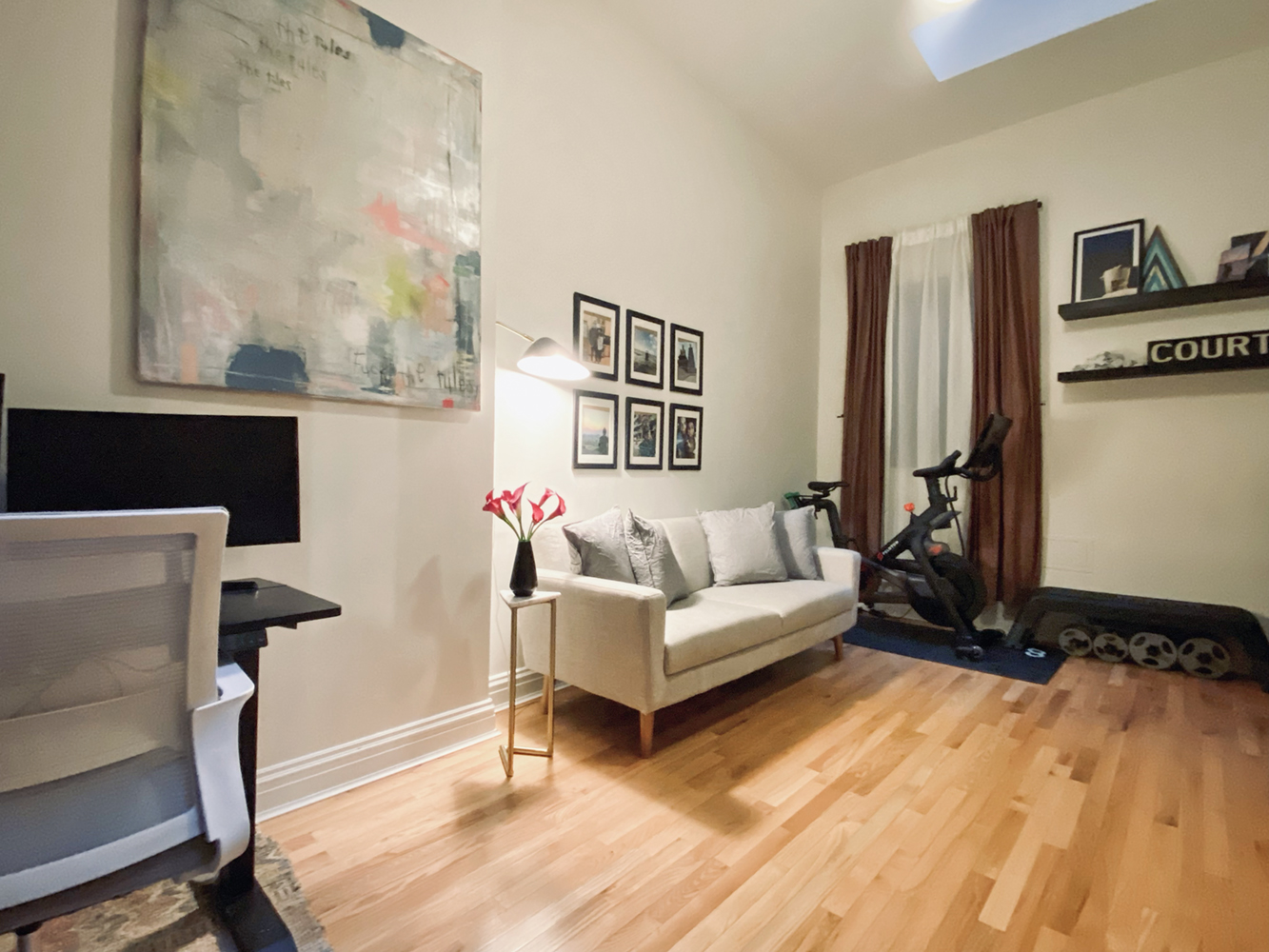 60 Court Street, Unit 2L Brooklyn, NY 11201 - Photo 9 of 9 a living room with furniture windows and a flat screen tv
