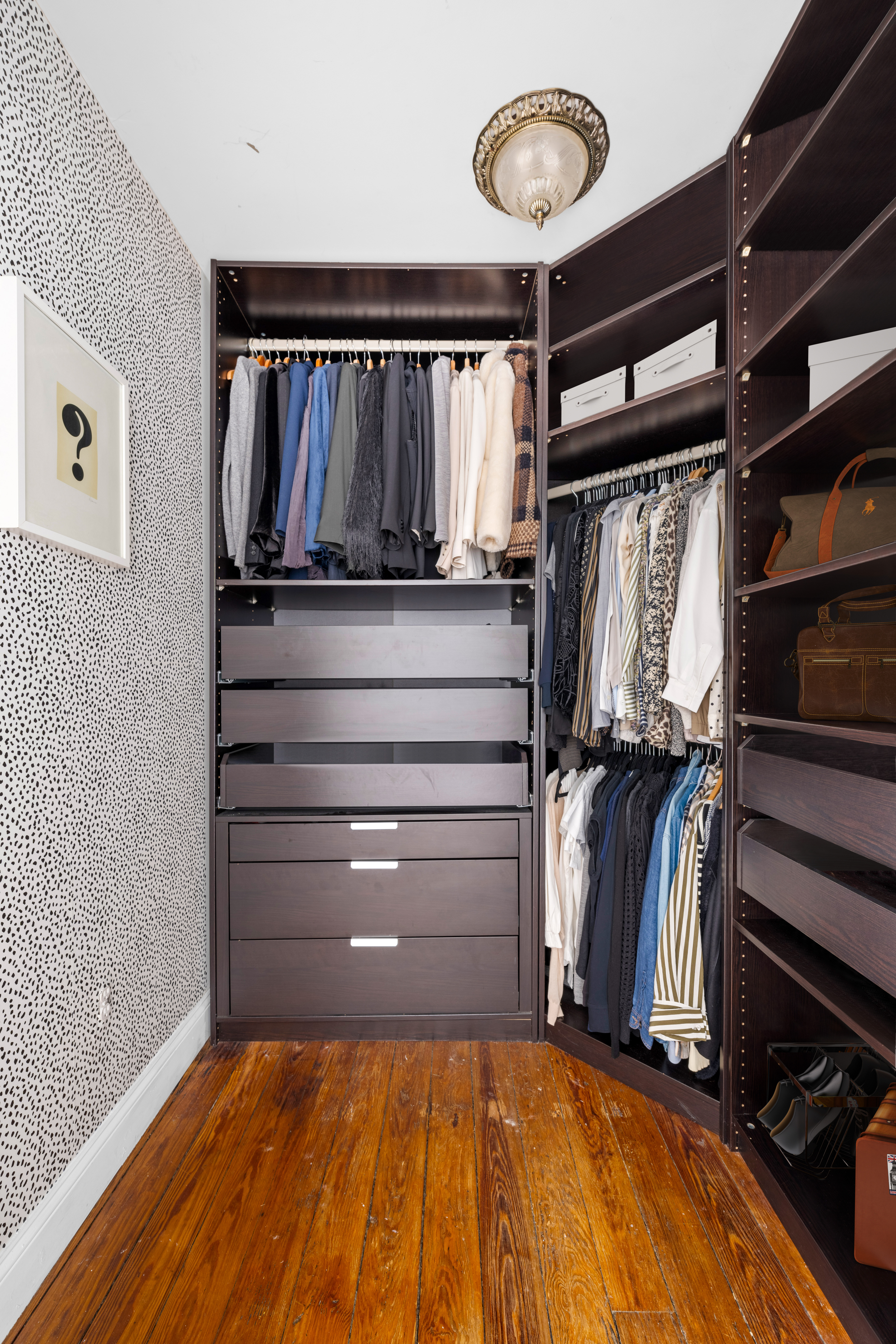 24 Harrison Street, Unit 3 Manhattan, NY 10013 - Photo 8 of 11 a view of a room with shelves