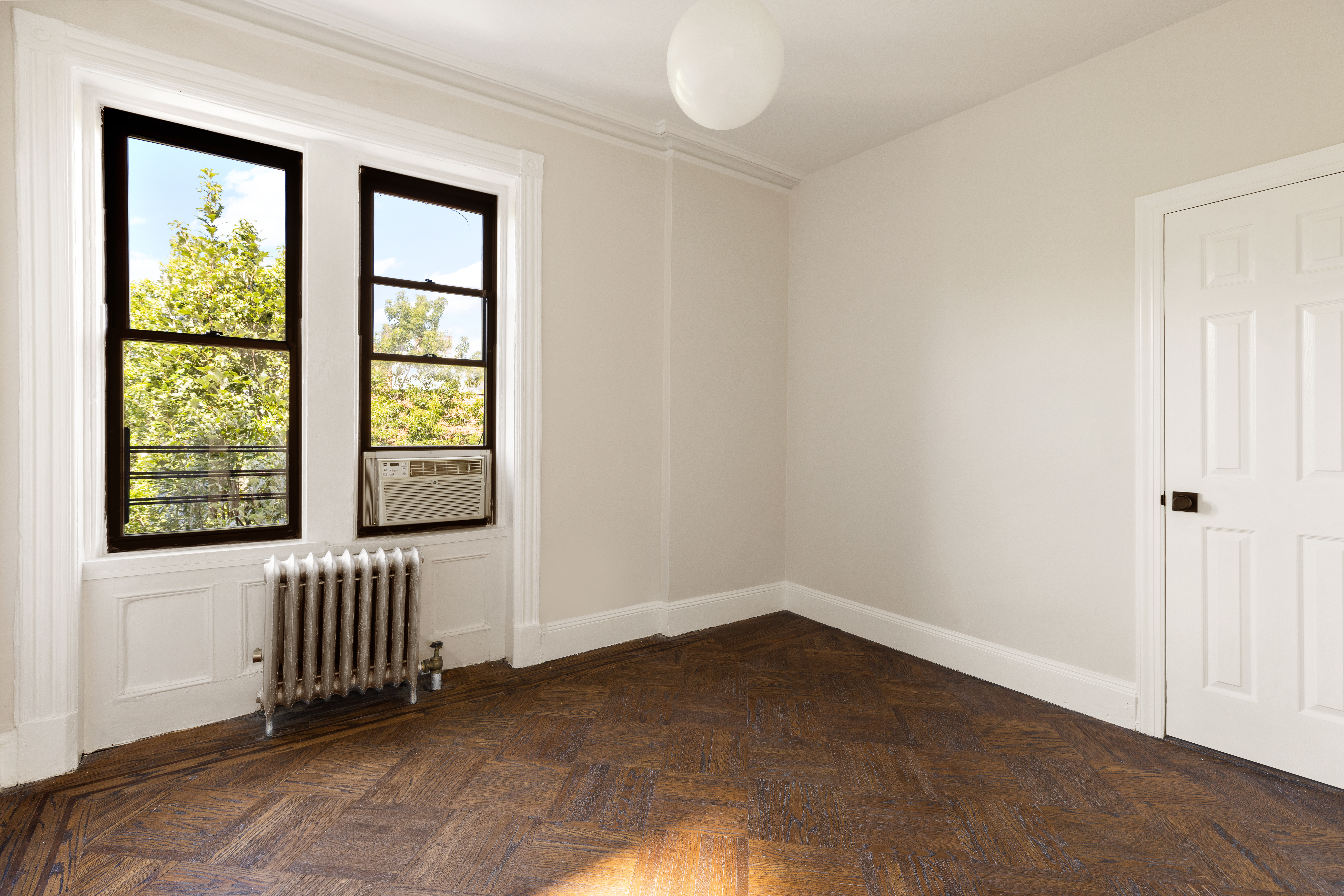 208 Warren Street Brooklyn, NY 11201 - Photo 6 of 10 an empty room with windows