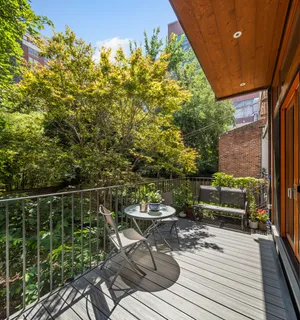 a view of balcony with seating space