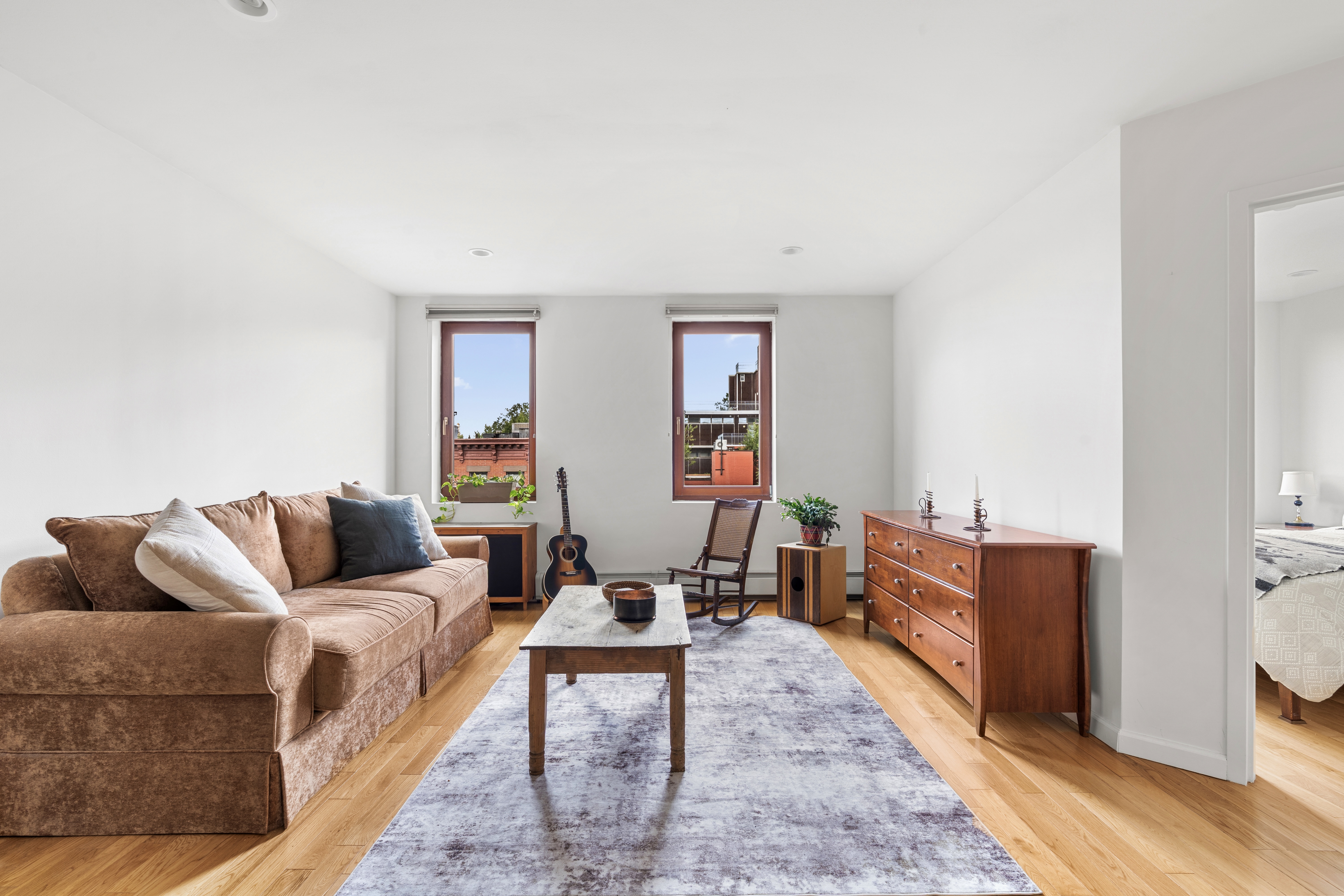 394 12th Street, Unit 5 Brooklyn, NY 11215 - Photo 2 of 14 a living room with furniture and wooden floor
