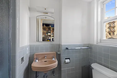 a bathroom with a sink and a toilet