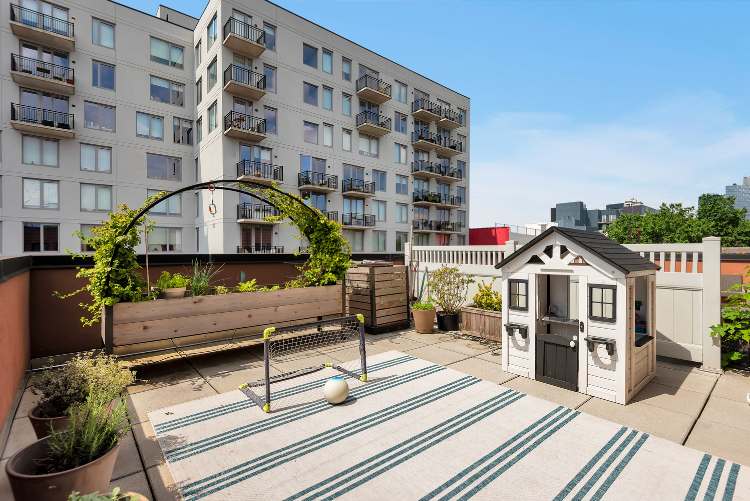 84 Lefferts Place, Unit 3B Brooklyn, NY 11238 - Photo 2 of 12 a front view of a building with glass windows and a table