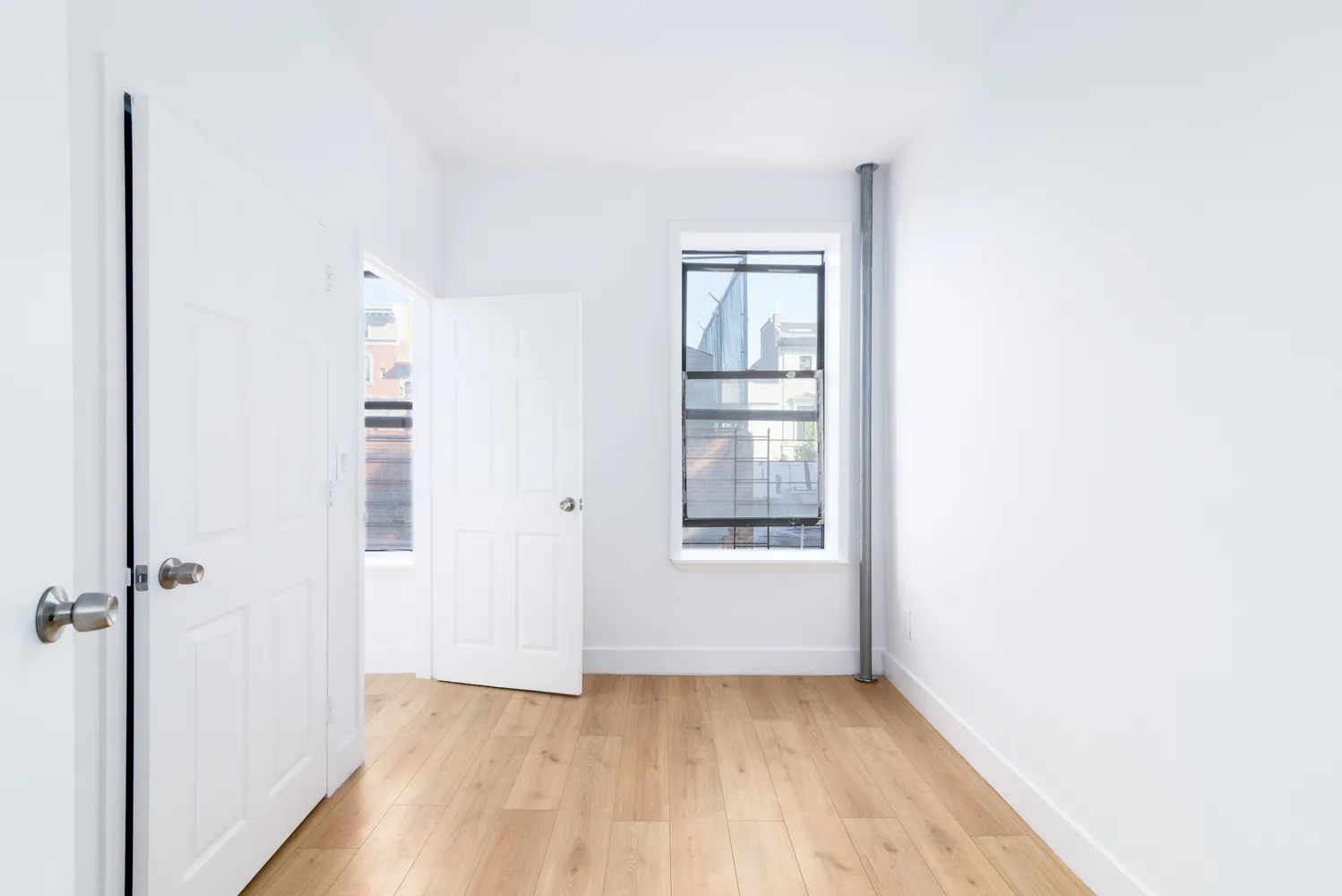 an empty room with windows