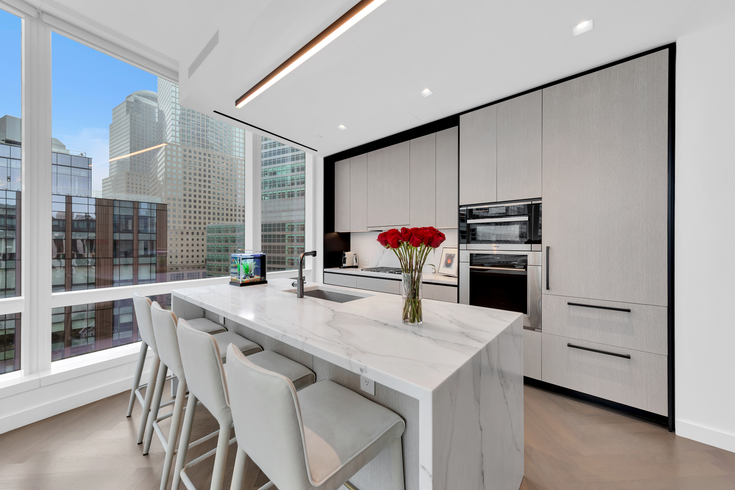 111 Murray Street, Unit 11C Manhattan, NY 10007 - Photo 4 of 14 a kitchen with a table and chairs