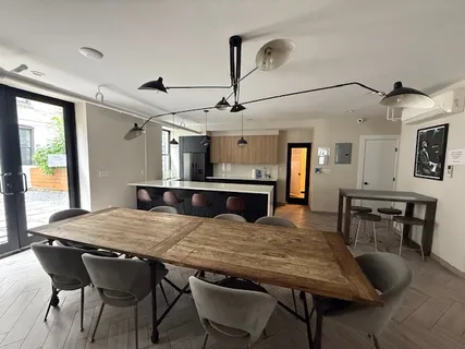 a view of a dining room with furniture