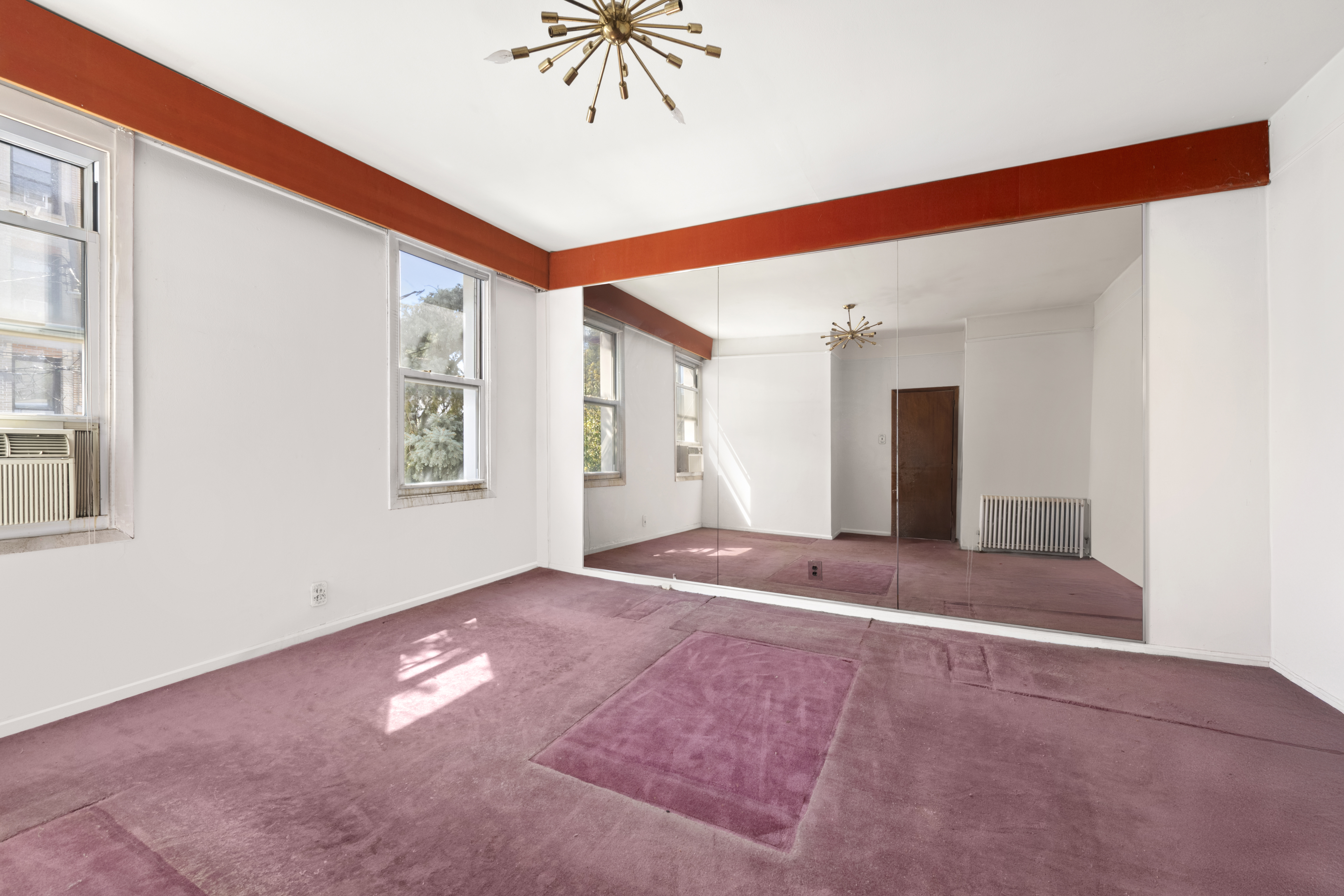 37-34 28th Street Queens, NY 11101 - Photo 11 of 17 a view of an empty room with a window