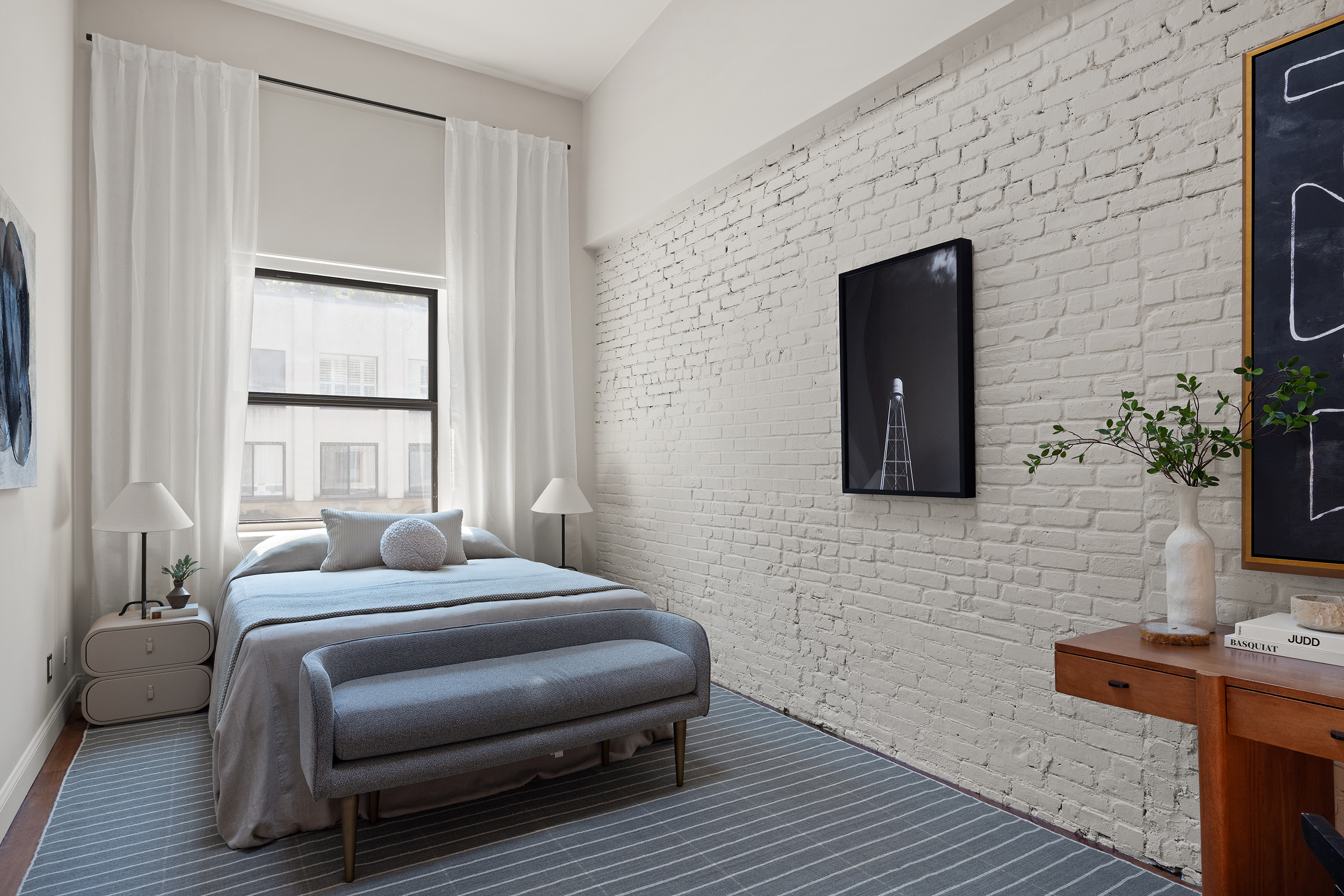 100 Reade Street, Unit 6CD Manhattan, NY 10013 - Photo 15 of 26 a bedroom with a bed and a flat screen tv