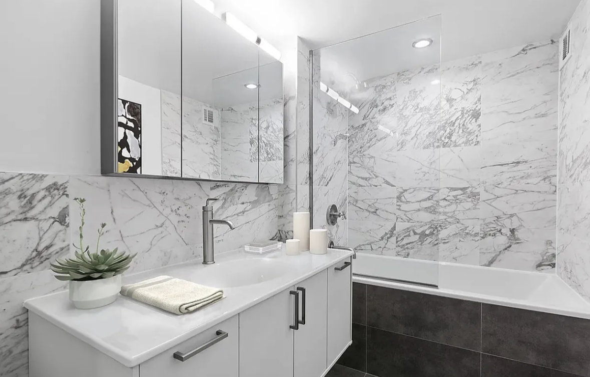 44 Berry Street, Unit 6B Brooklyn, NY 11249 - Photo 5 of 9 a bathroom with a sink and a mirror