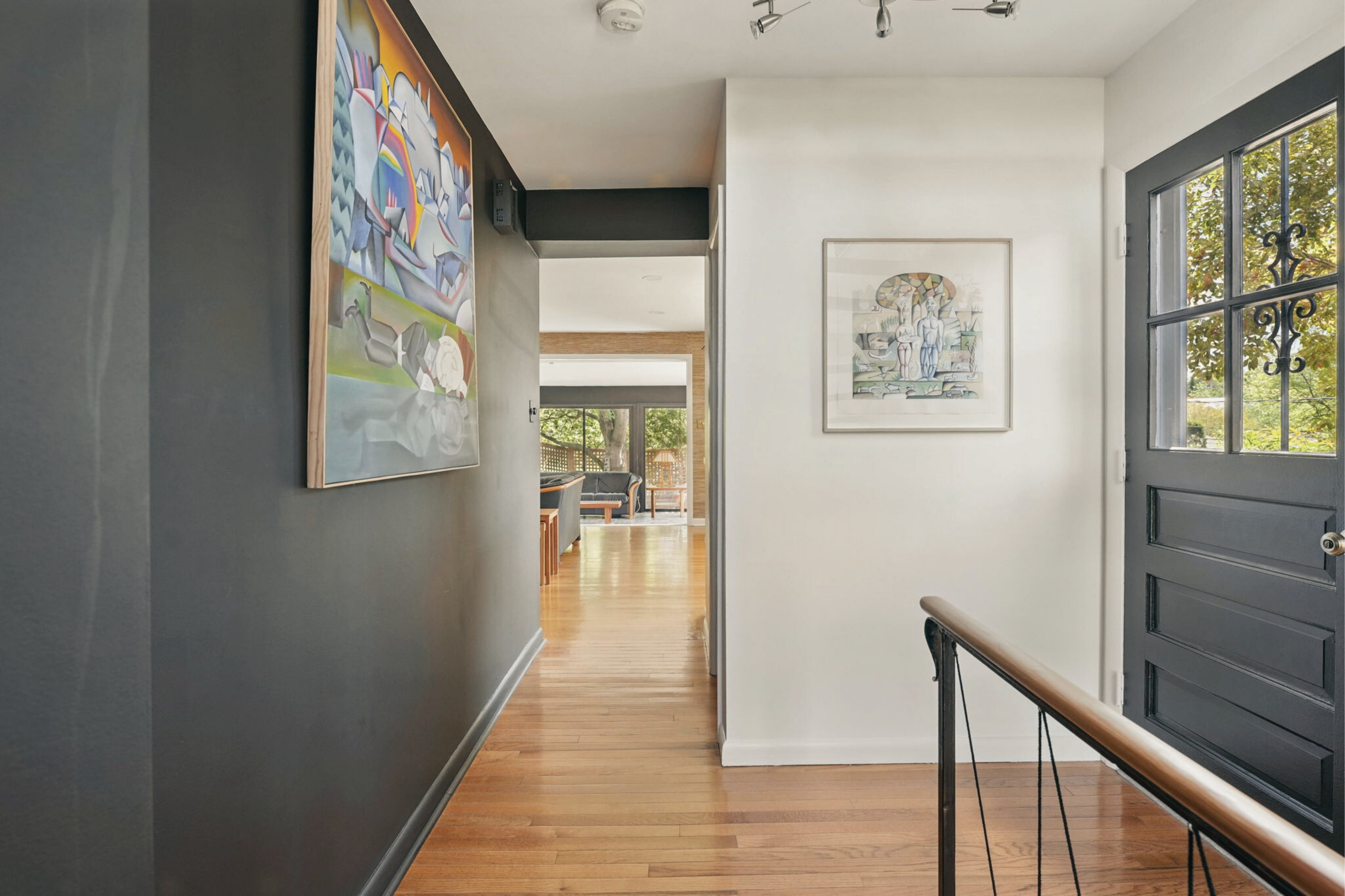 8003 16th Street Northwest Washington, DC 20012 - Photo 13 of 38 a view of a hallway with windows and wooden floor