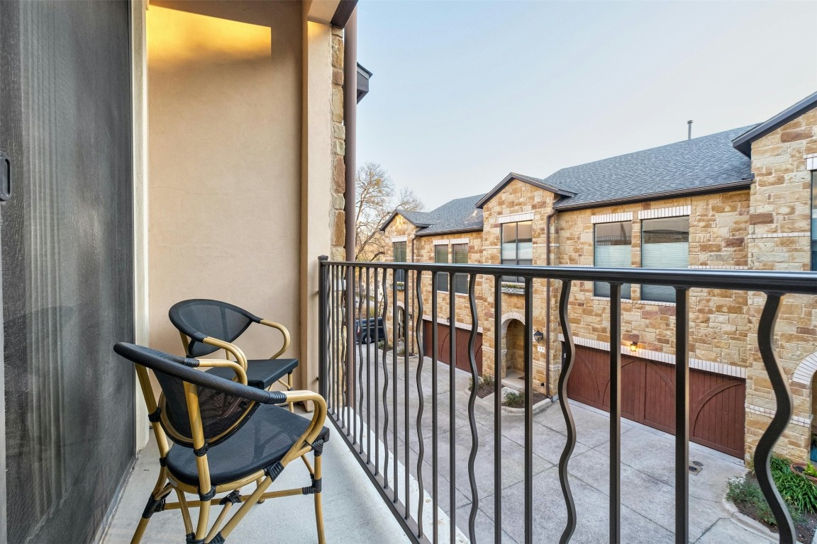 2505 Enfield Road, Unit 4 Austin, TX 78703 - Photo 9 of 19 a view of a balcony with chairs
