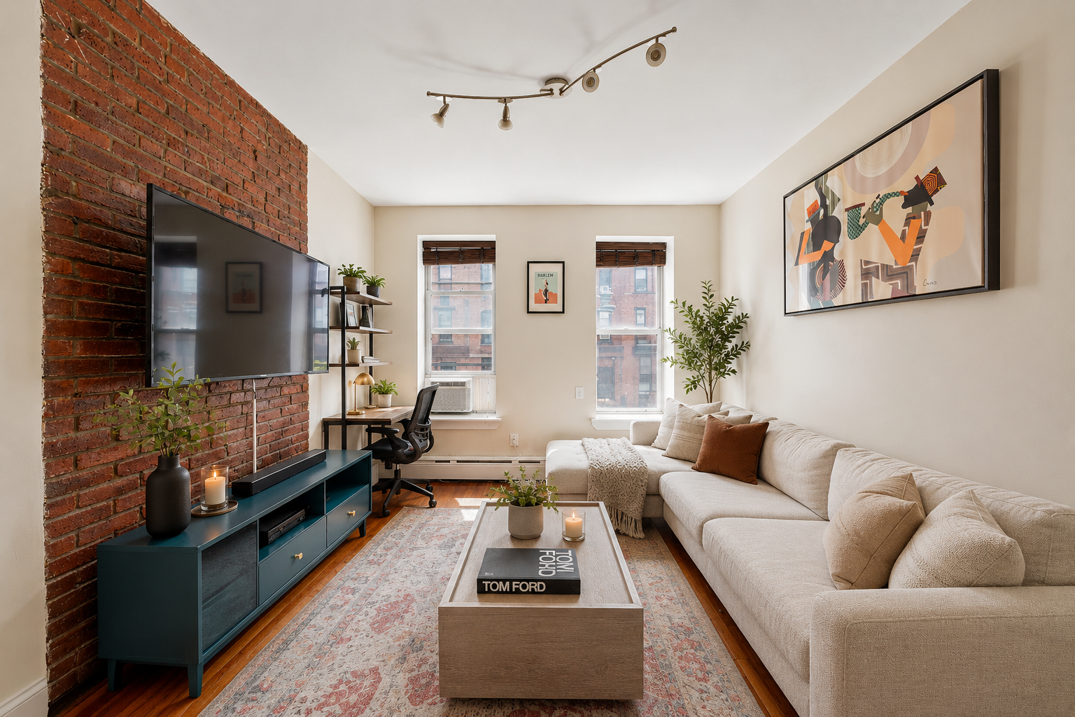 161 West 133rd Street, Unit 2B Manhattan, NY 10030 - Photo 2 of 15 a living room with furniture and a flat screen tv