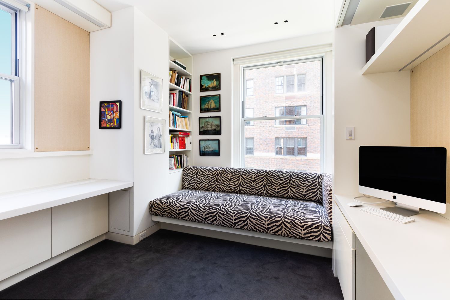 876 Park Avenue, Unit 7N Manhattan, NY 10075 - Photo 9 of 21 a living room with a couch and a flat screen tv