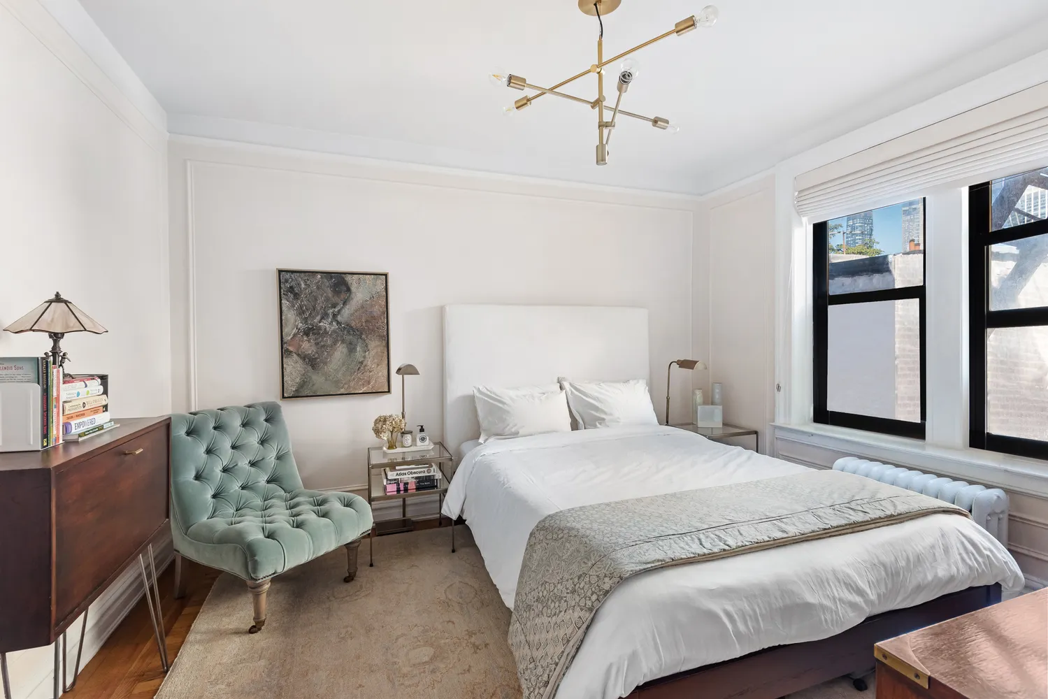 a bedroom with bed and window