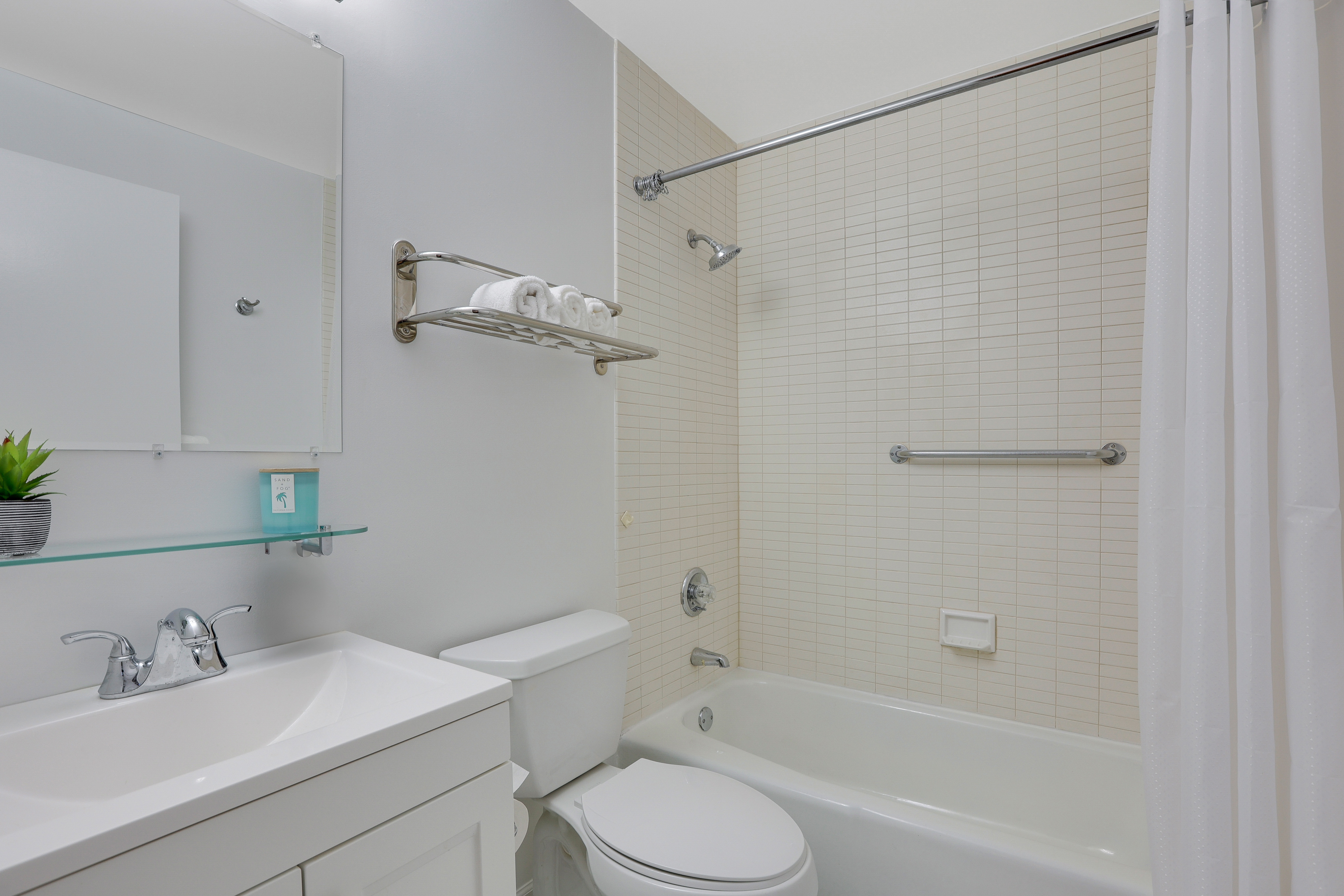 1255 5th Avenue, Unit 5B Manhattan, NY 10029 - Photo 9 of 12 a bathroom with a sink toilet and shower