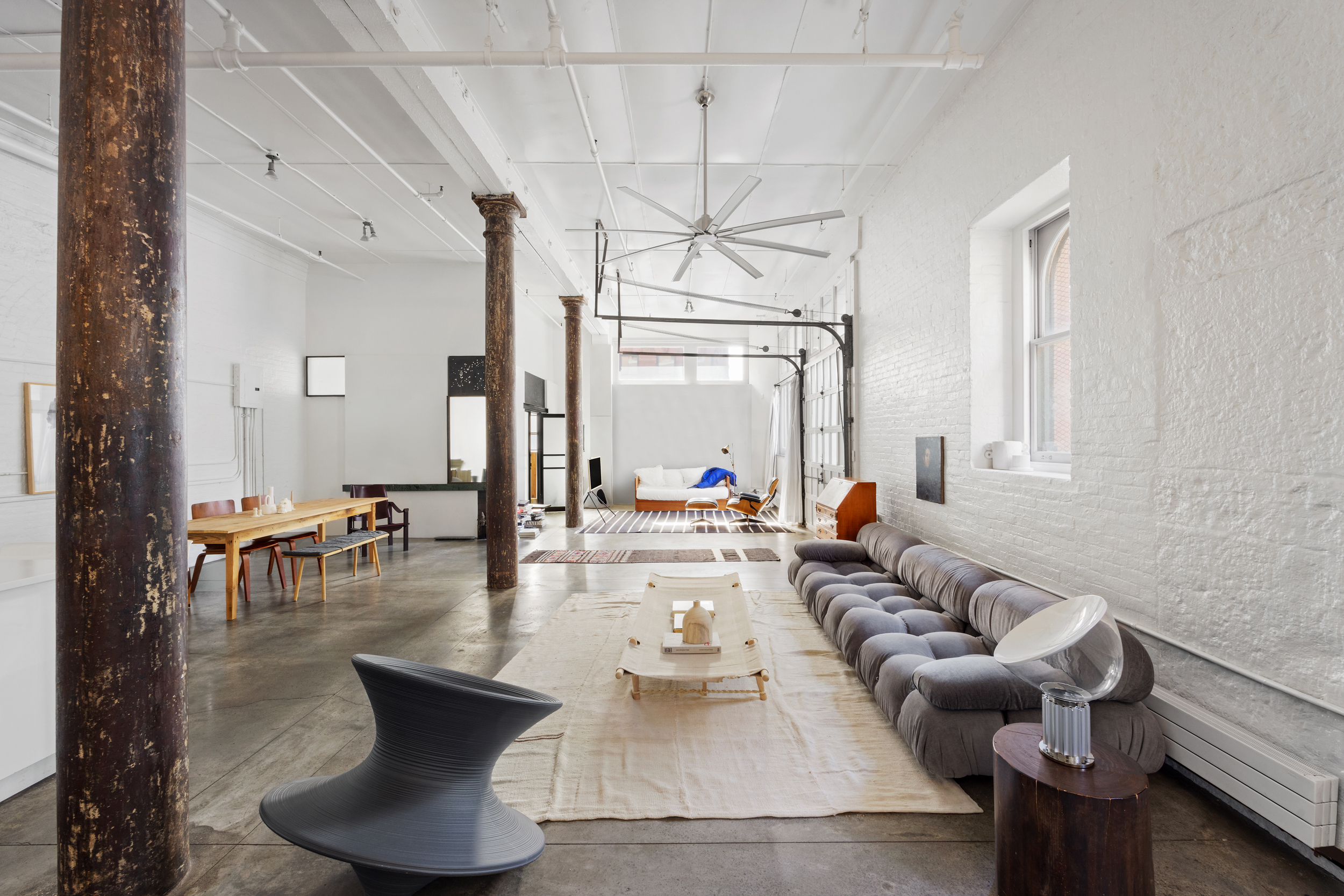 125 Watts Street, Unit 1 Manhattan, NY 10013 - Photo 4 of 24 a living room with furniture