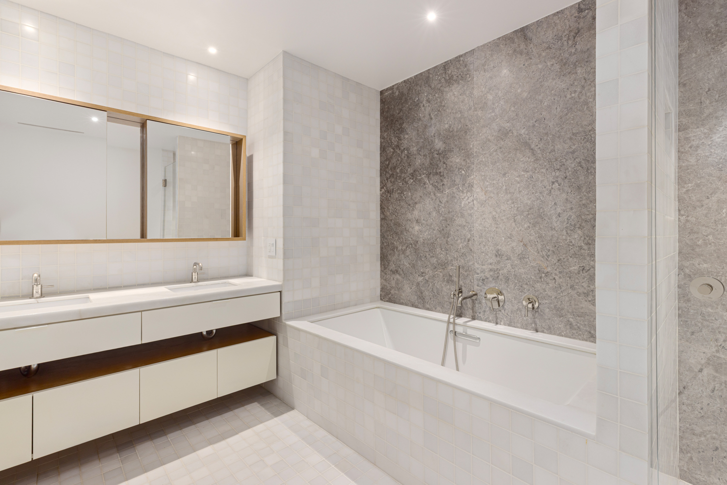 30 Warren Street, Unit 2A Manhattan, NY 10007 - Photo 7 of 10 a bathroom with a bathtub and a sink