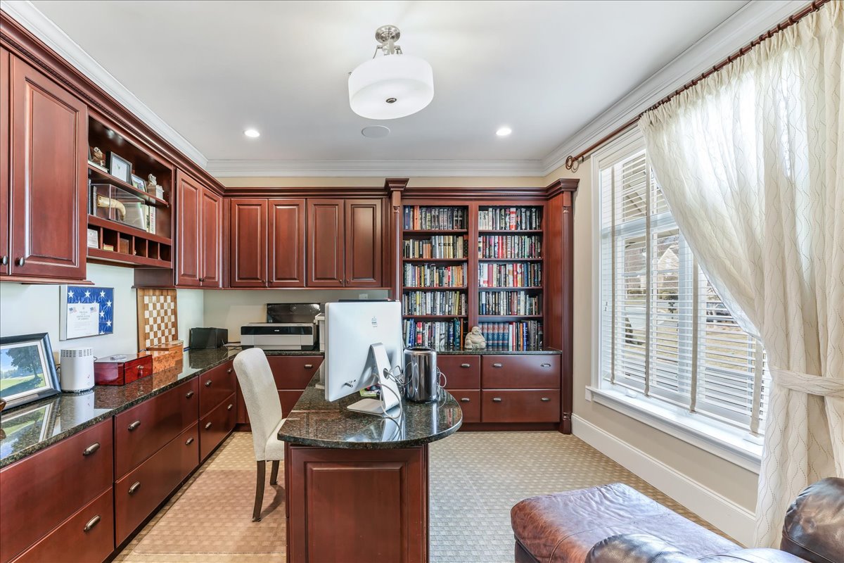 248 Valley Ridge Road Haverford, PA 19041 - Photo 24 of 44 a view of a workspace with furniture and a window