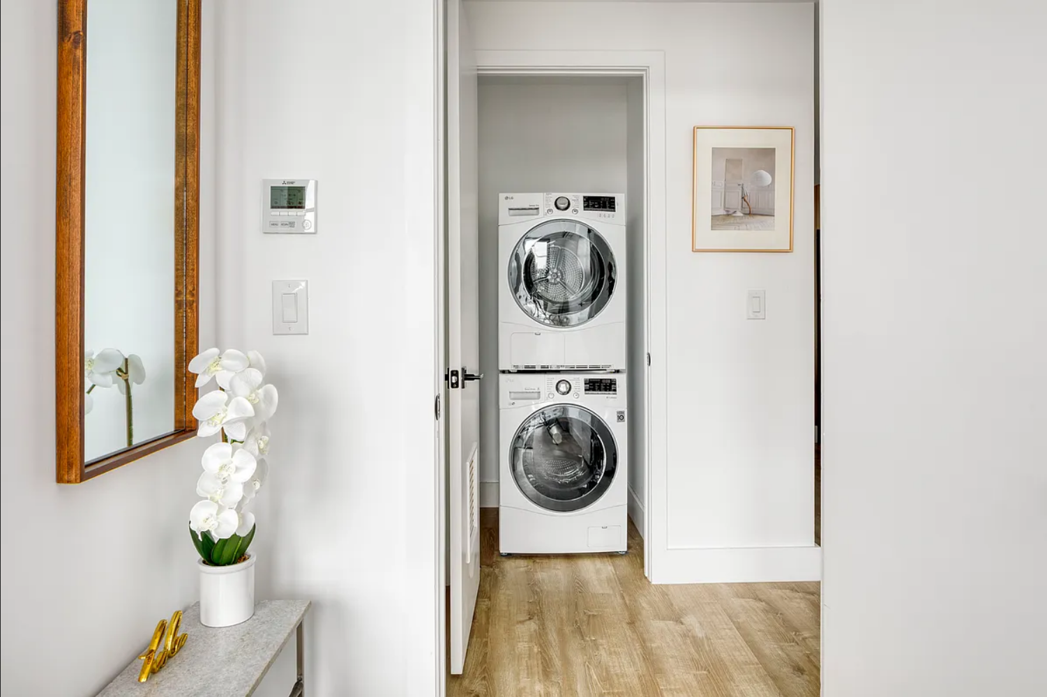 1425 Fulton Street, Unit 4A Brooklyn, NY 11216 - Photo 10 of 12 a utility room with dryer and washer