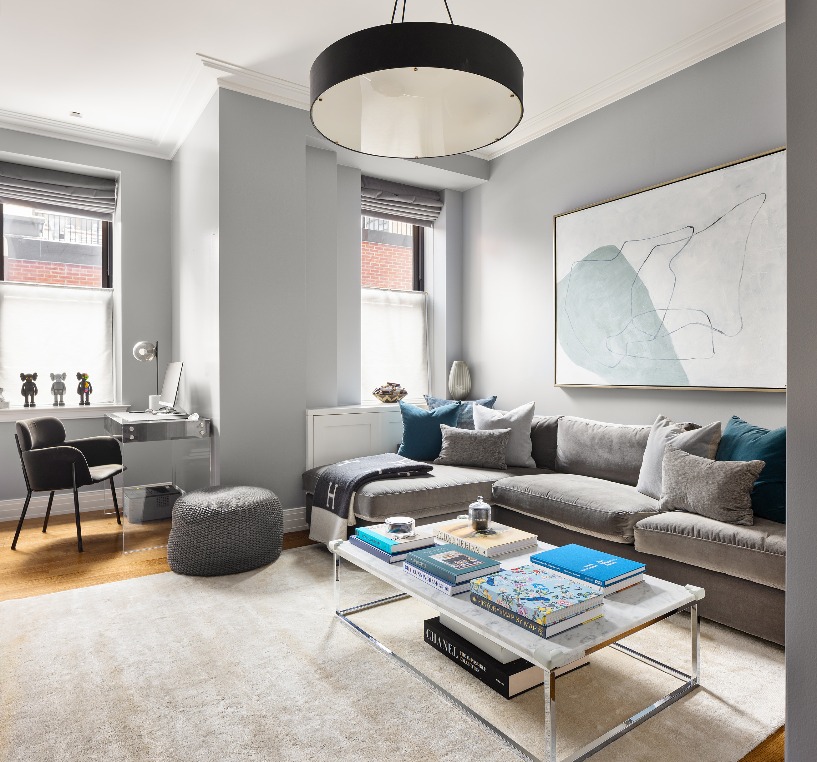 235 West 75th Street, Unit 505 Manhattan, NY 10023 - Photo 12 of 23 a living room with furniture a rug and a window
