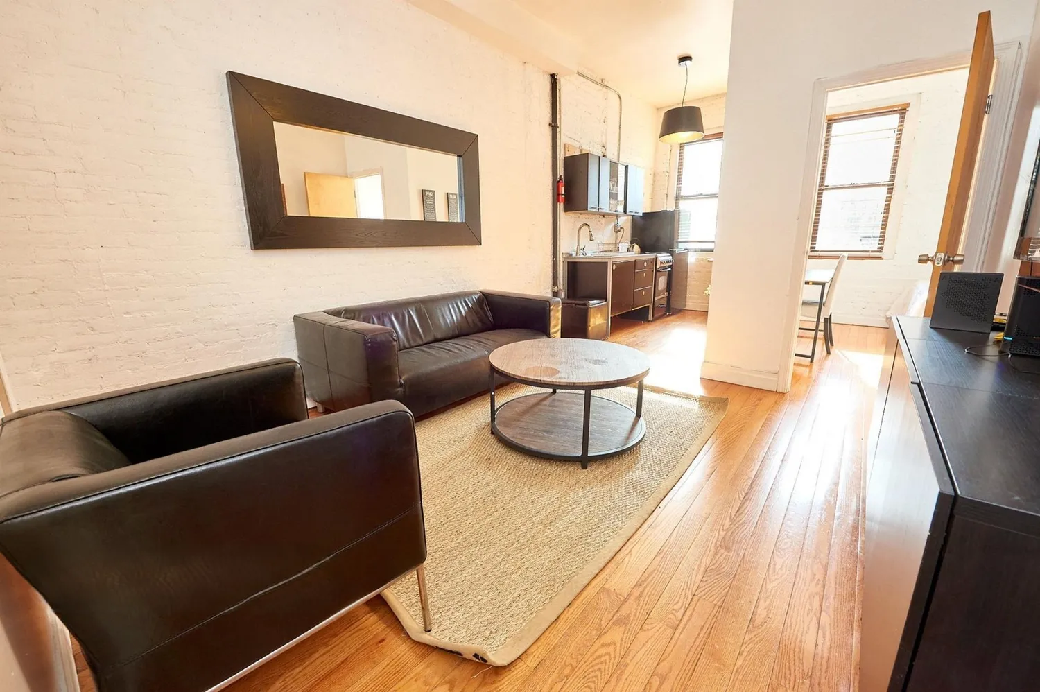 a living room with furniture and a couch