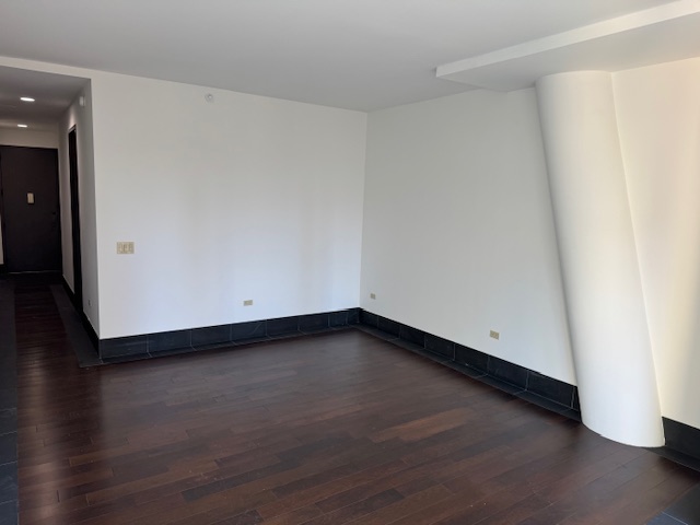 40 Broad Street, Unit 25C Manhattan, NY 10004 - Photo 2 of 10 a view of an empty room