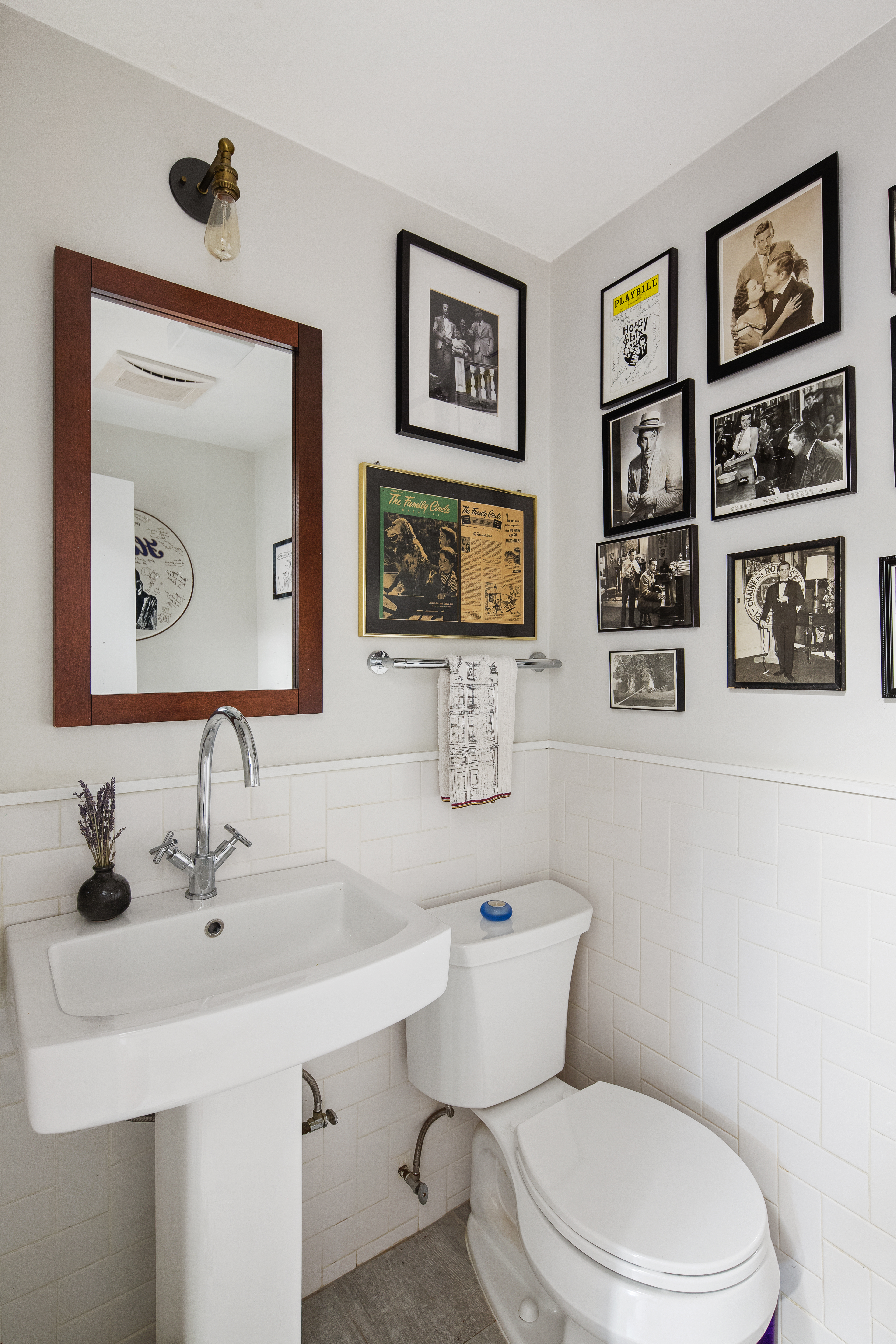 11 Sylvan Terrace Manhattan, NY 10032 - Photo 13 of 16 a bathroom with a toilet a sink and mirror