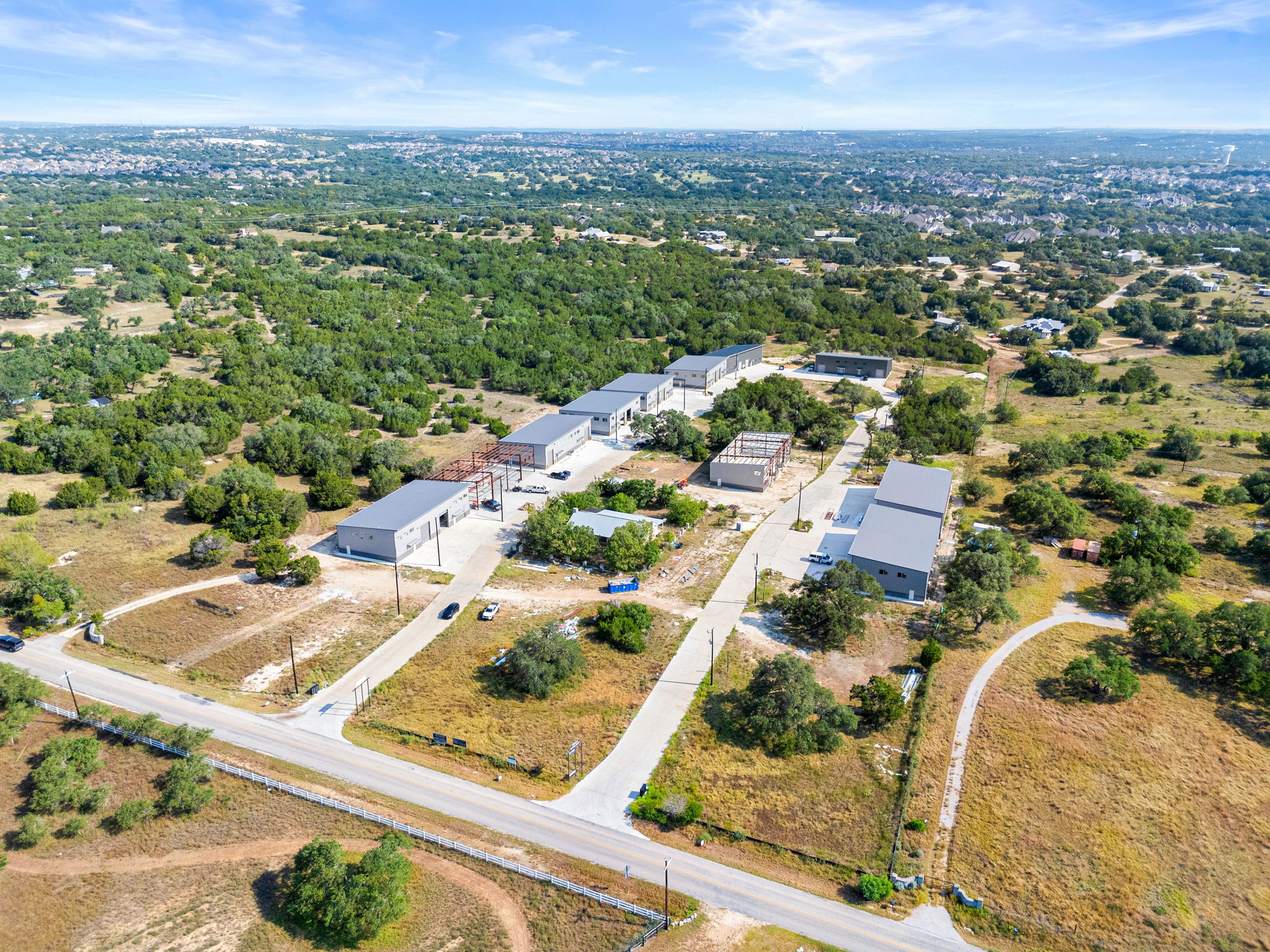 10020 Darden Hill Road, Unit 401 Austin, TX 78737 - Photo 42 of 50 an aerial view of residential houses with outdoor space