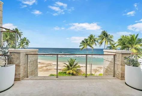 a view of a swimming pool with a porch