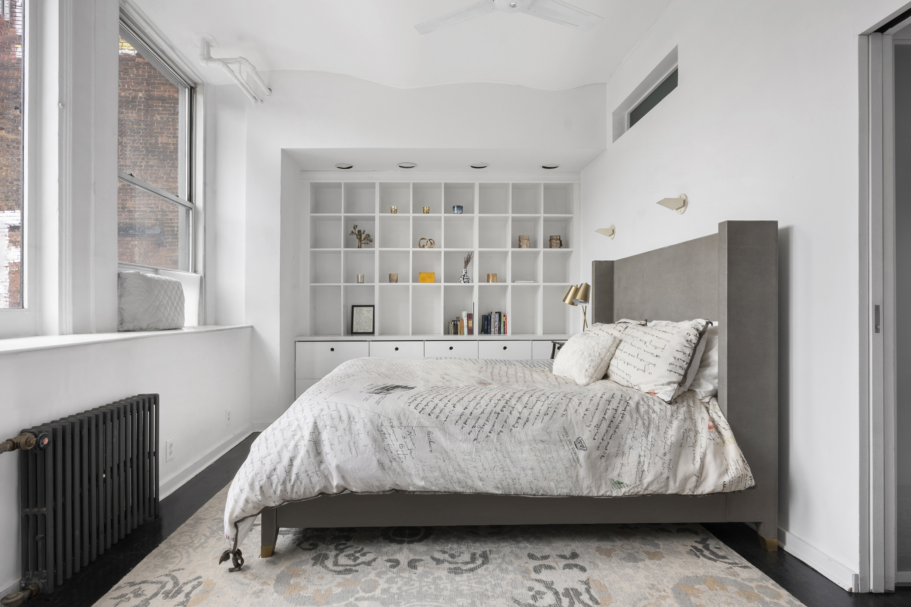 45 Lispenard Street, Unit 3E Manhattan, NY 10013 - Photo 6 of 9 a bedroom with a bed and window