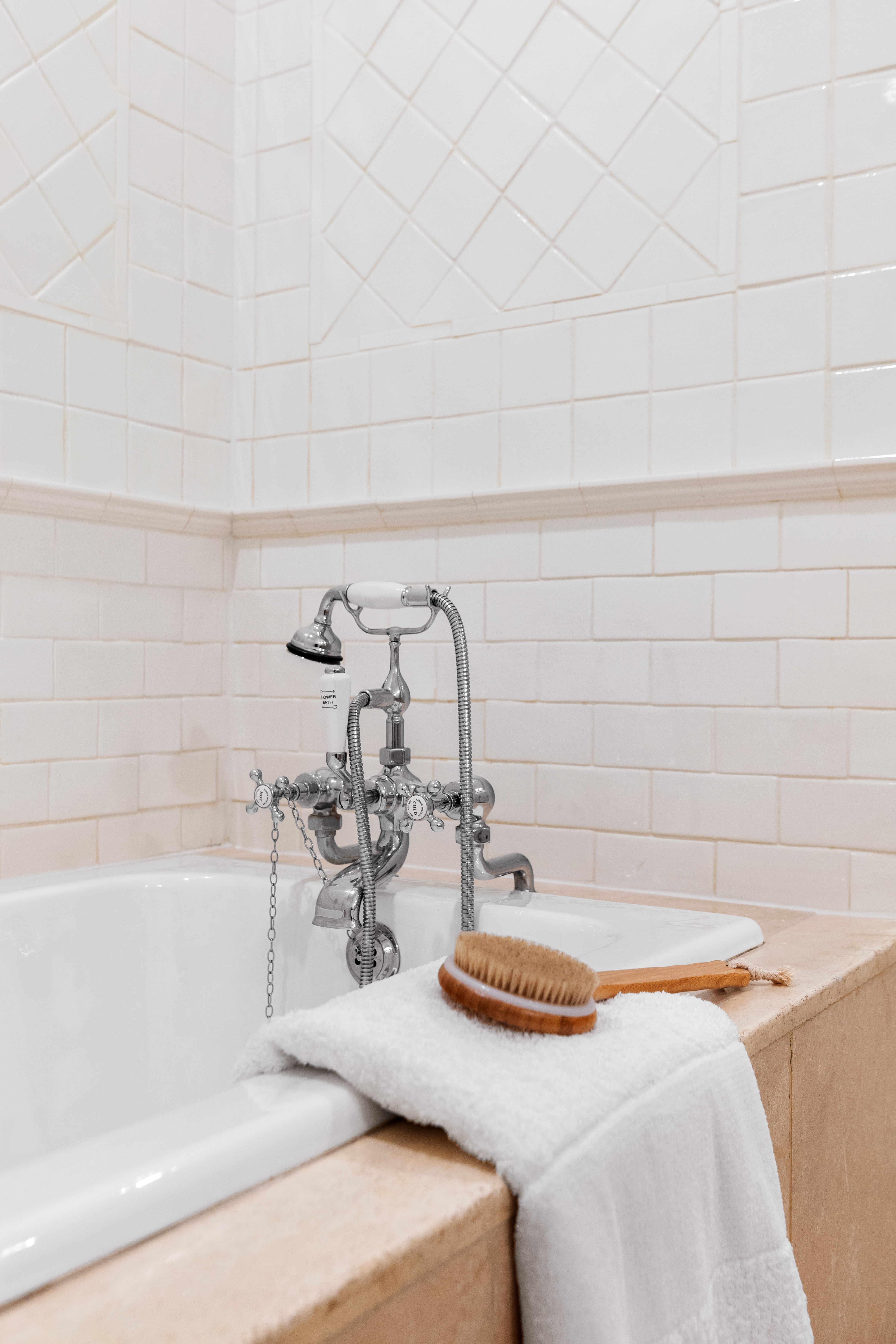 388 West Broadway, Unit 2 Manhattan, NY 10012 - Photo 19 of 27 a bathroom with a sink and a bathtub