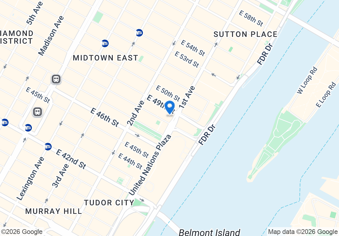 865 1st Avenue, Unit 9C Manhattan, NY 10017 - Photo 12 of 13 a picture of a book and a white bed