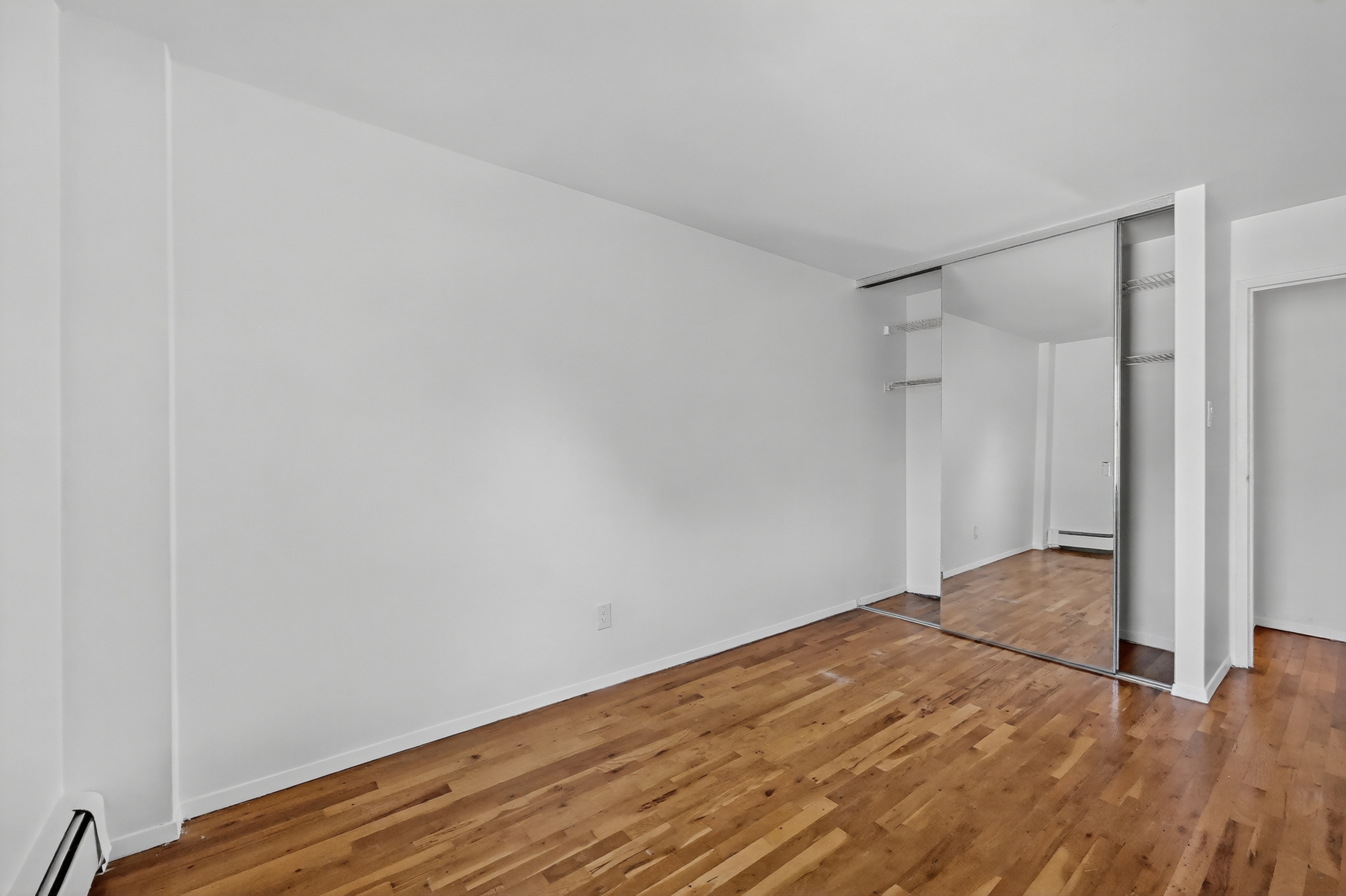 81 President Street, Unit 51-A Brooklyn, NY 11231 - Photo 23 of 27 a view of empty room with wooden floor