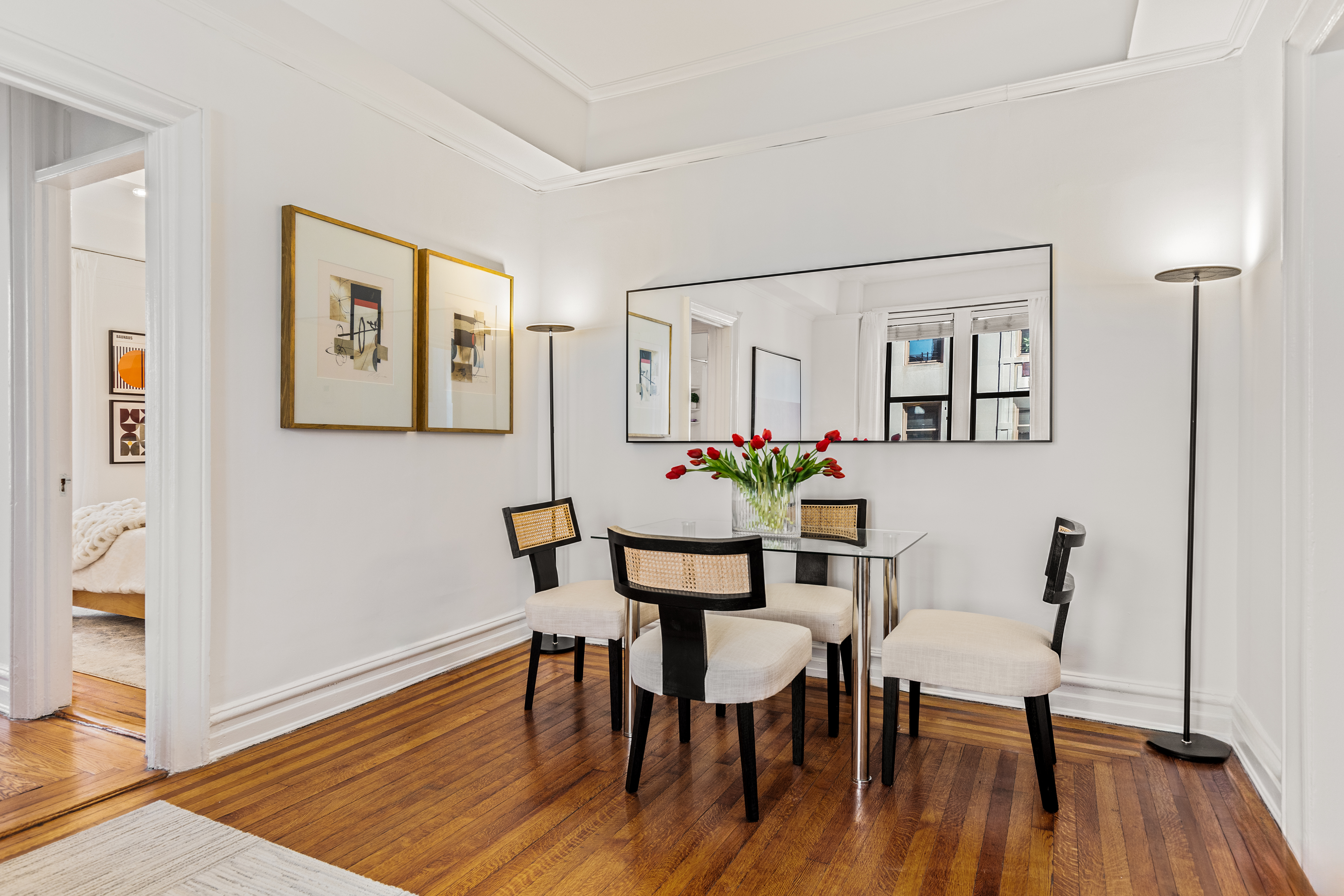 599 West End Avenue, Unit 5A Manhattan, NY 10024 - Photo 2 of 11 a view of a dining room with furniture and wooden floor