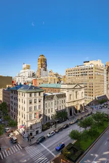 a front view of a building with street view
