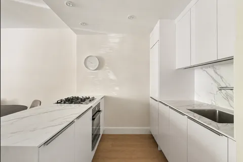 a utility room with washer and dryer