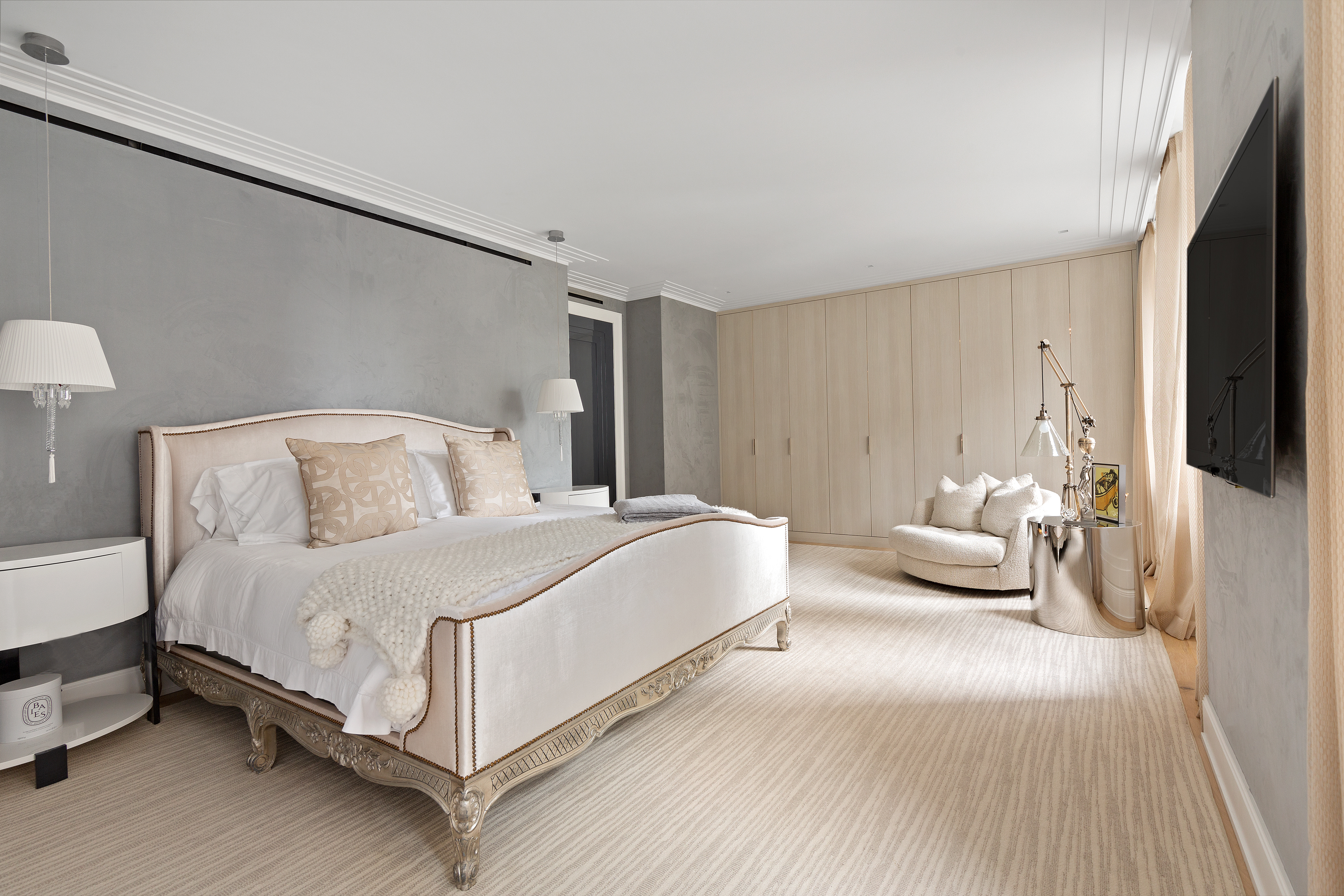 55 Liberty Street, Unit 15 Manhattan, NY 10005 - Photo 12 of 25 a bedroom with a bed lamp and a flat tv screen