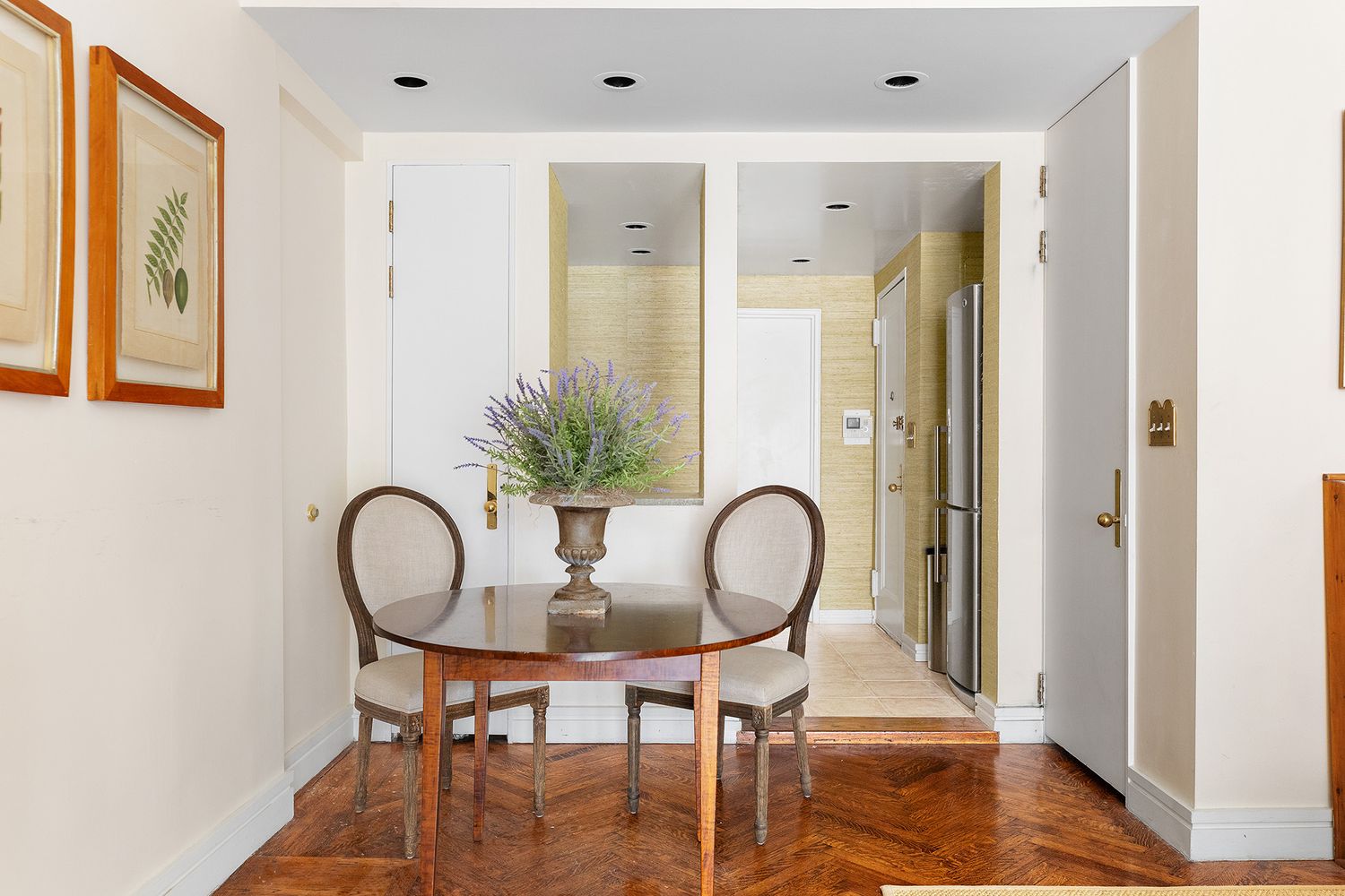 60 East 79th Street, Unit 3B Manhattan, NY 10075 - Photo 2 of 8 a living room with furniture and a window